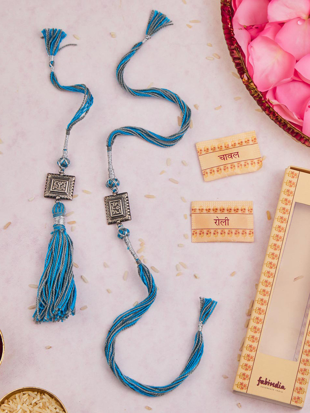 

Fabindia Unisex Set Of 2 Thread Rakhis With Roli Chawal, Silver