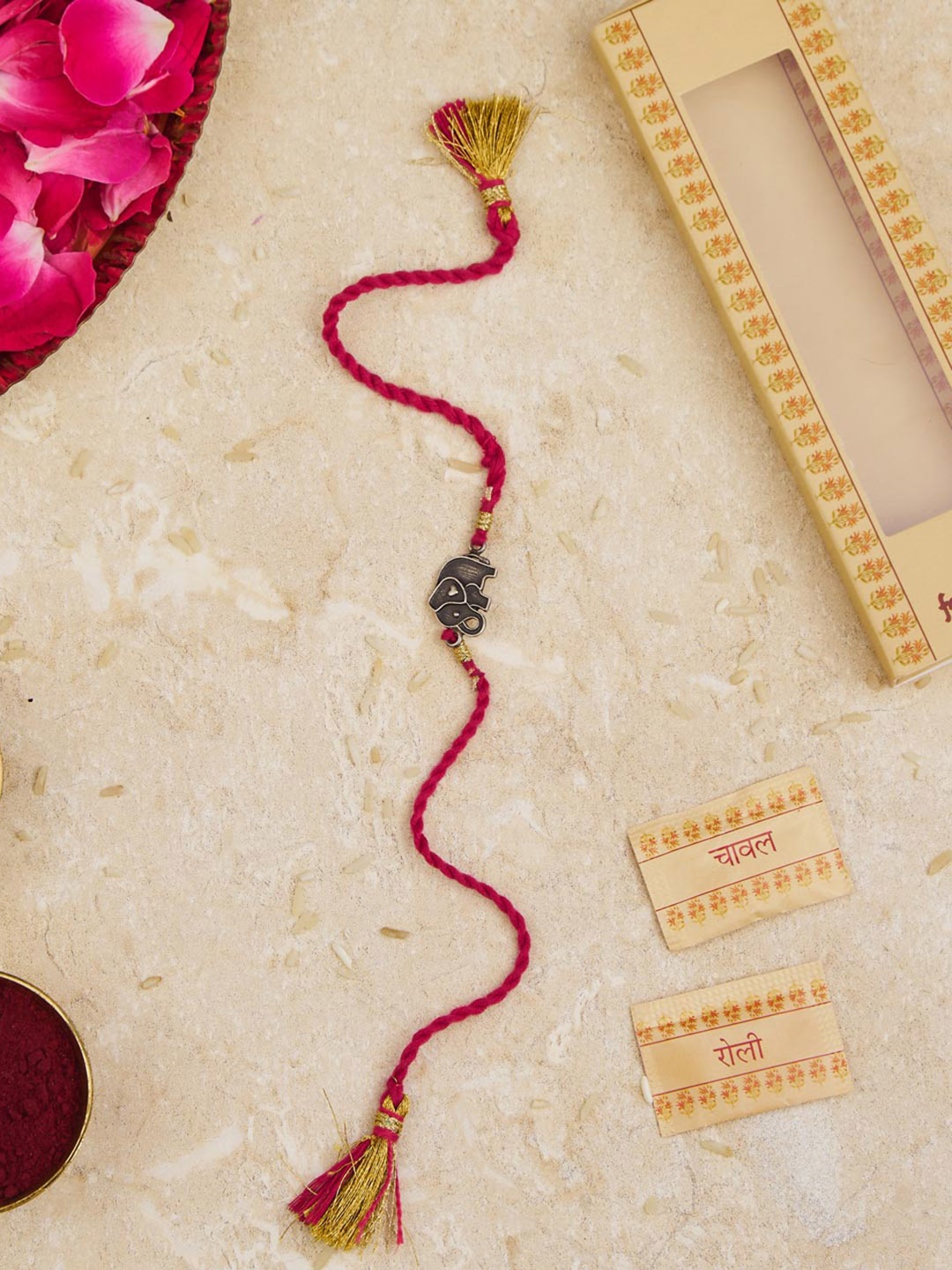 

Fabindia Kids Elephant Charm Thread Rakhi With Roli Chawl Pack, Silver