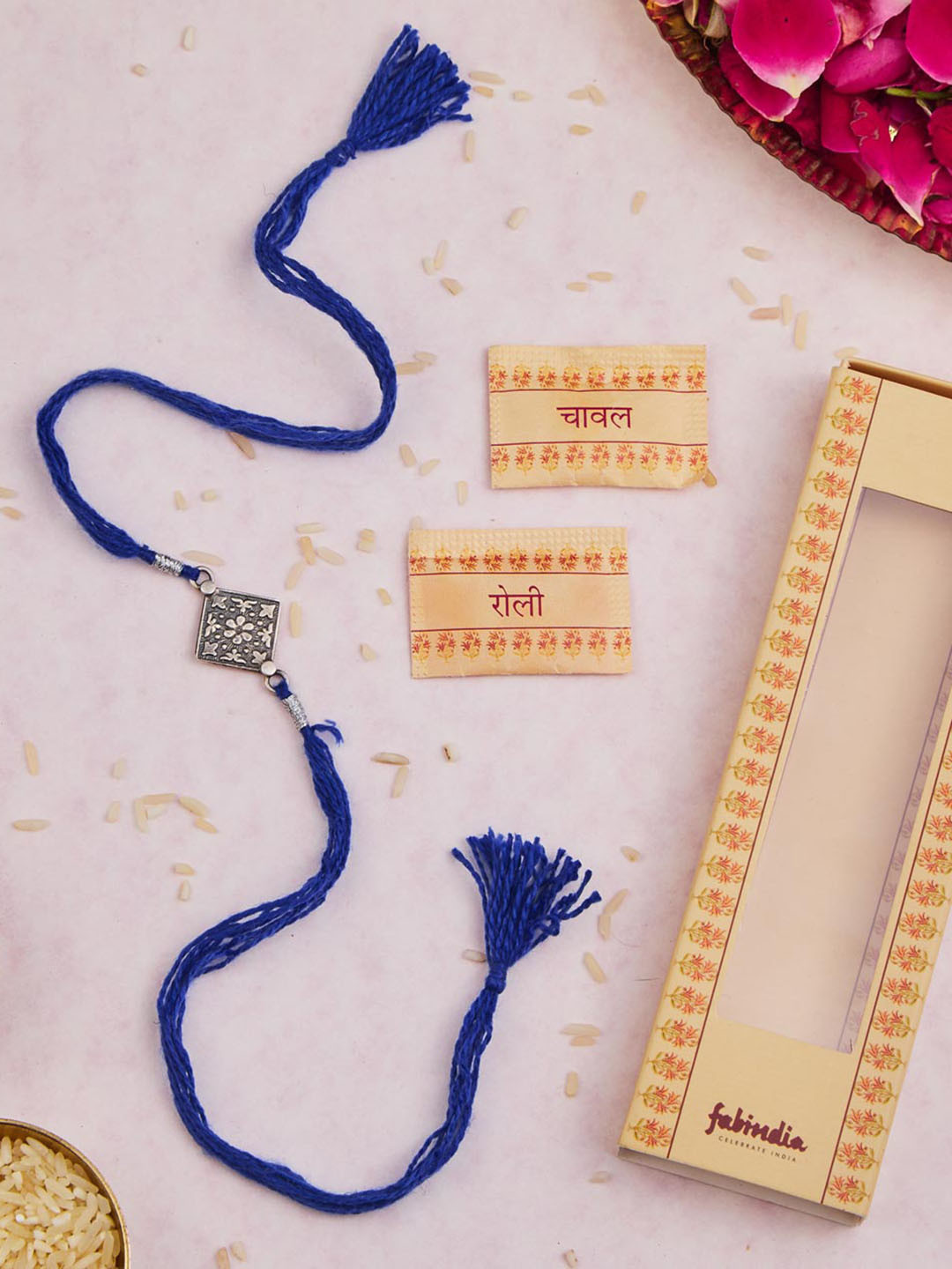 

Fabindia Unisex Silver Artificial Stones Studded Patra Rakhi With Roli & Chawal