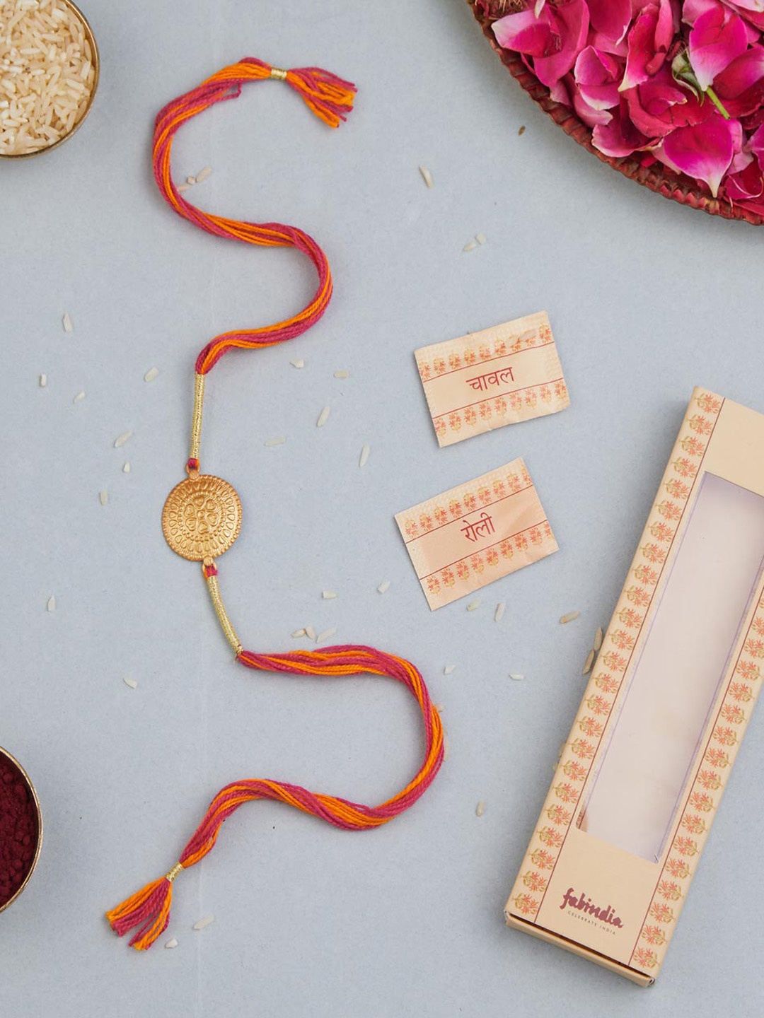 

Fabindia Unisex Gold Plated Silver Patra Rakhi With Roli & Chawal