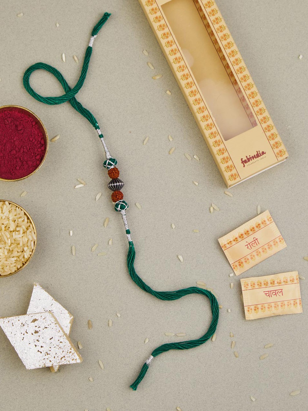 

Fabindia Unisex Rudraksh Rakhi With Roli & Chawal, Silver