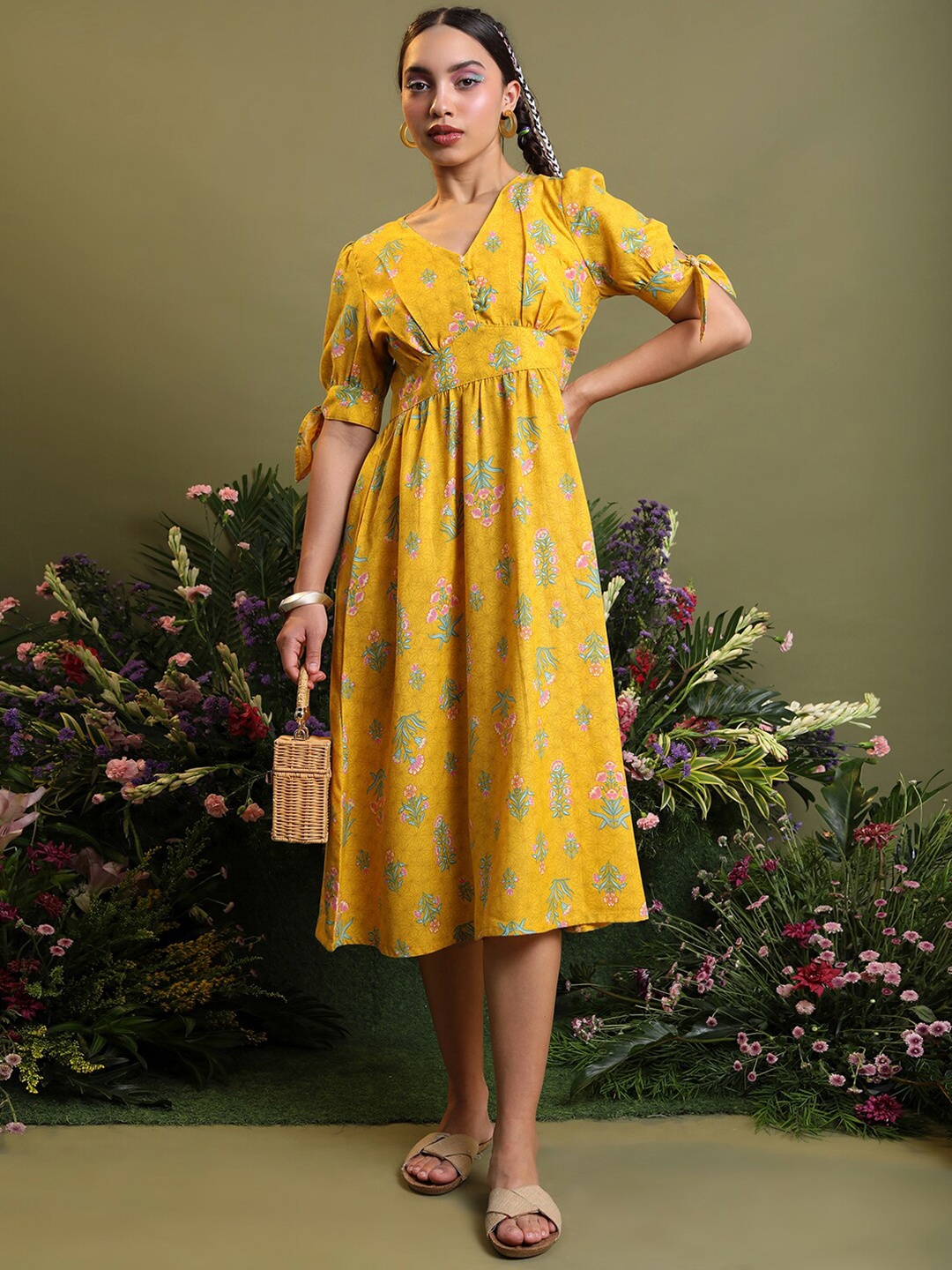 

Vishudh Yellow Floral Printed V-Neck Puff Sleeves Pleated Empire Midi Dress