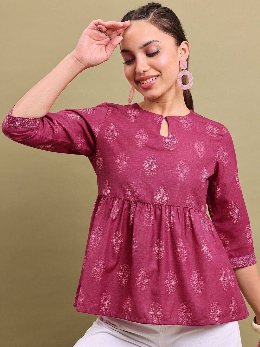 

Vishudh Pink Floral Printed Keyhole Neck Peplum Top