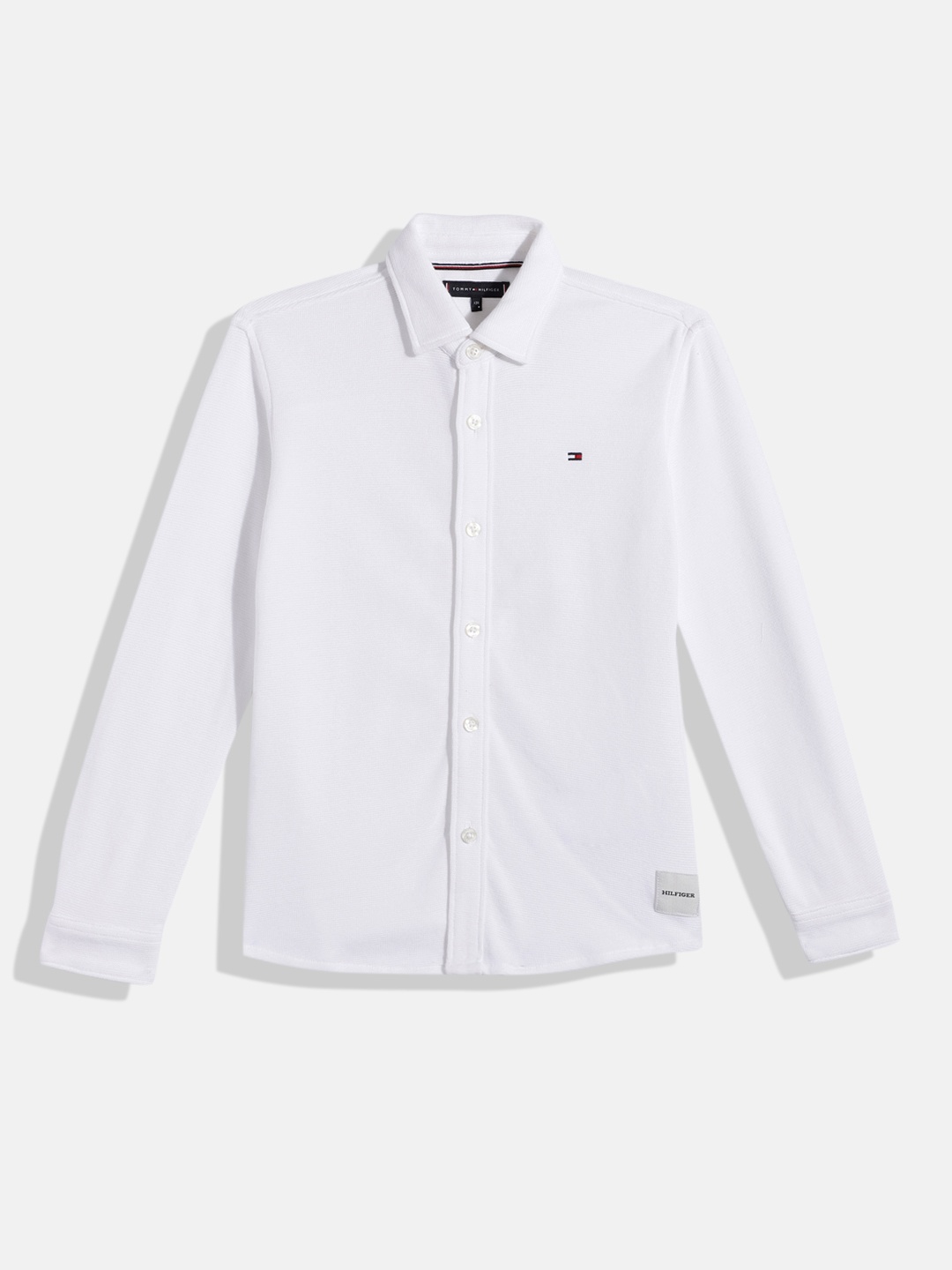 

Tommy Hilfiger Boys Solid Pure Cotton Knitted Shirt, White