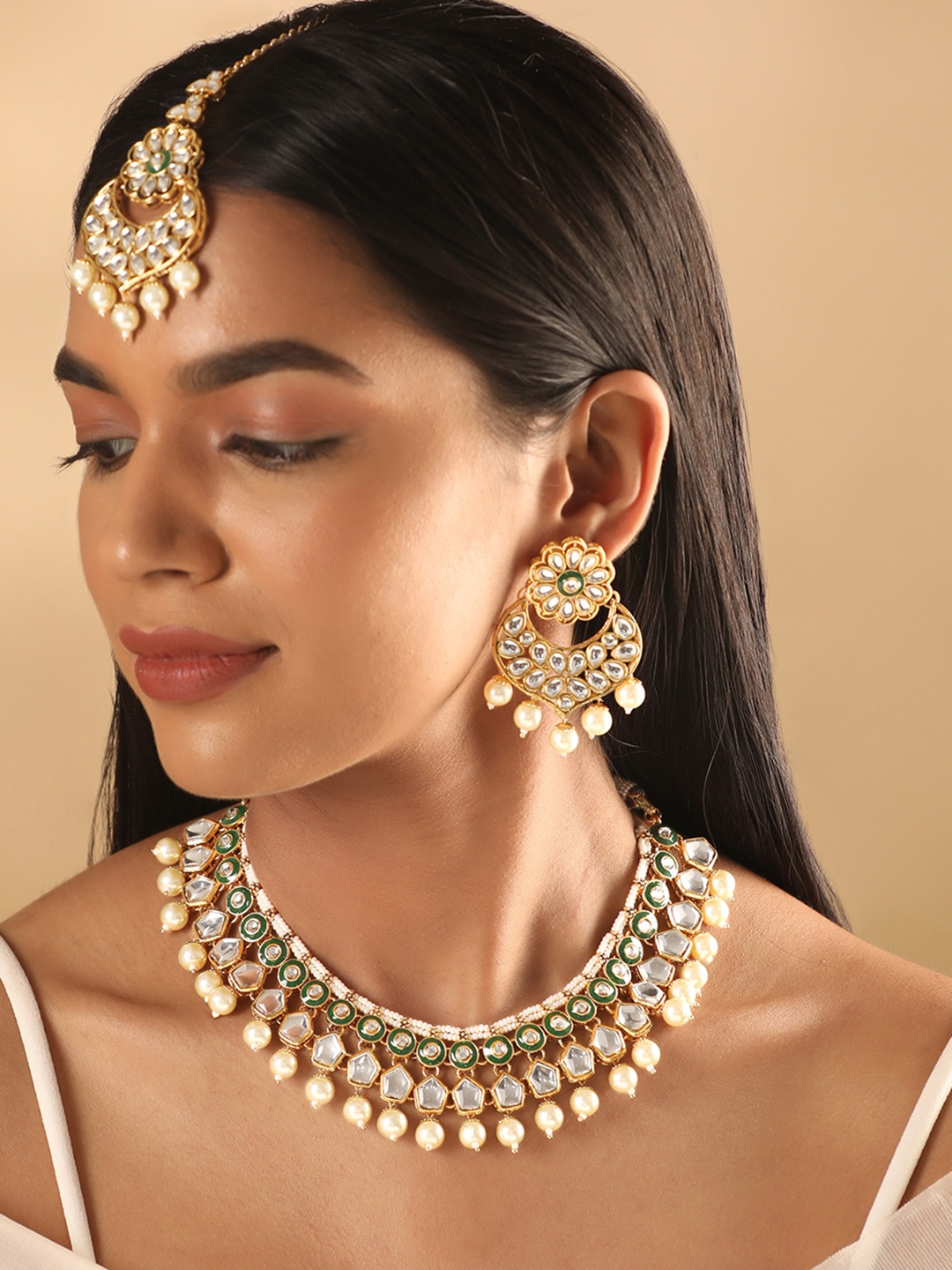 

Rubans 24K Gold Plated Kundan Studded Green Enemal Pearl Beaded Jewellery Set
