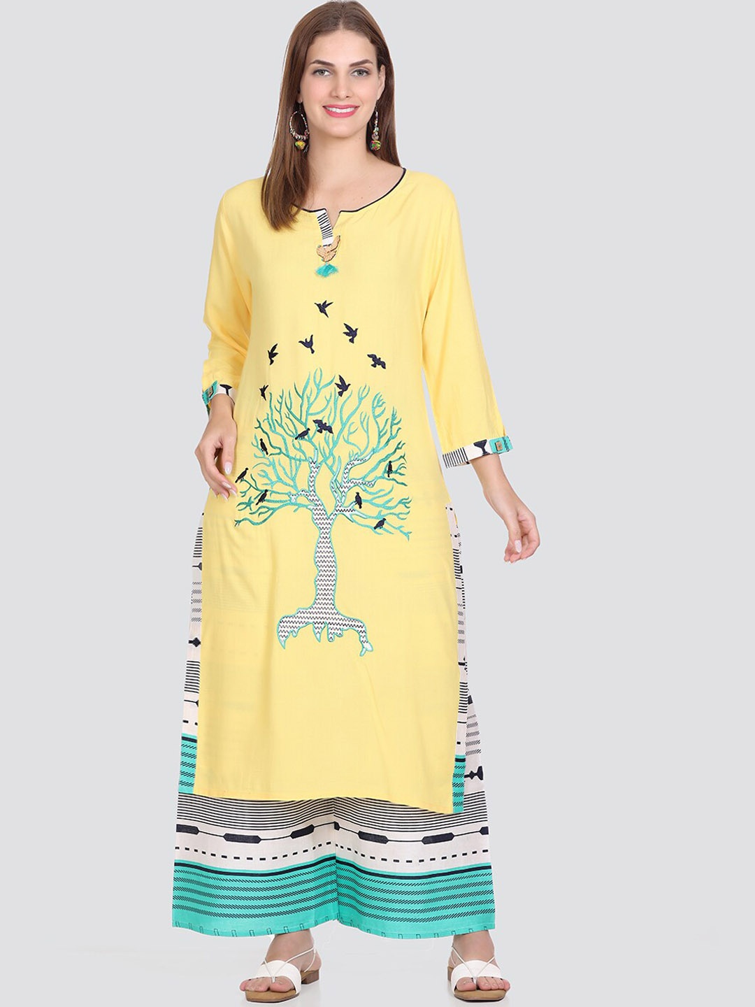 

Elthia Quirky Embroidered Thread Work Kurta With Palazzos, Yellow