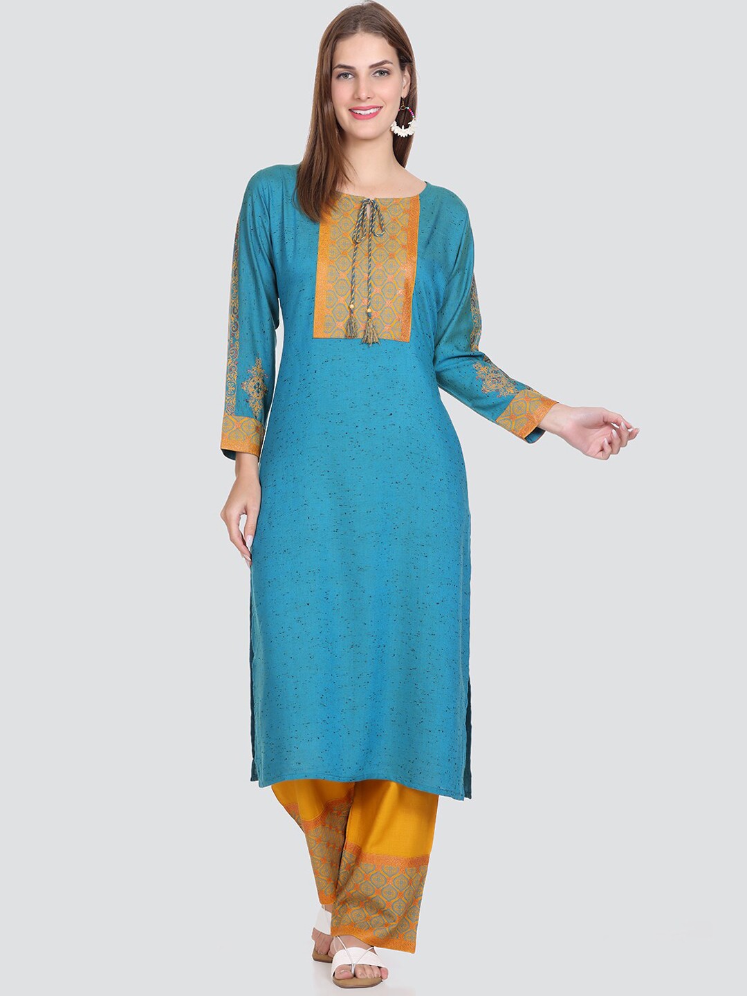 

Elthia Round Neck Ethnic Motifs Printed Regular Kurta with Trousers, Blue