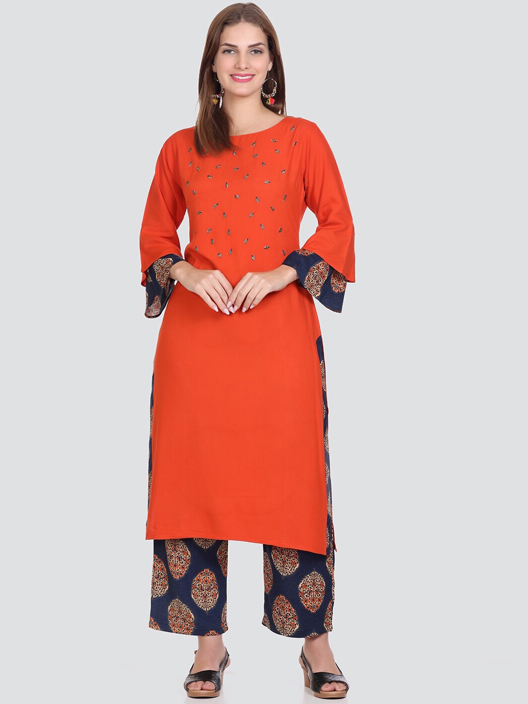 

Elthia Round Neck Ethnic Motifs Beads And Stones Flared Sleeve Kurta with Palazzos, Orange