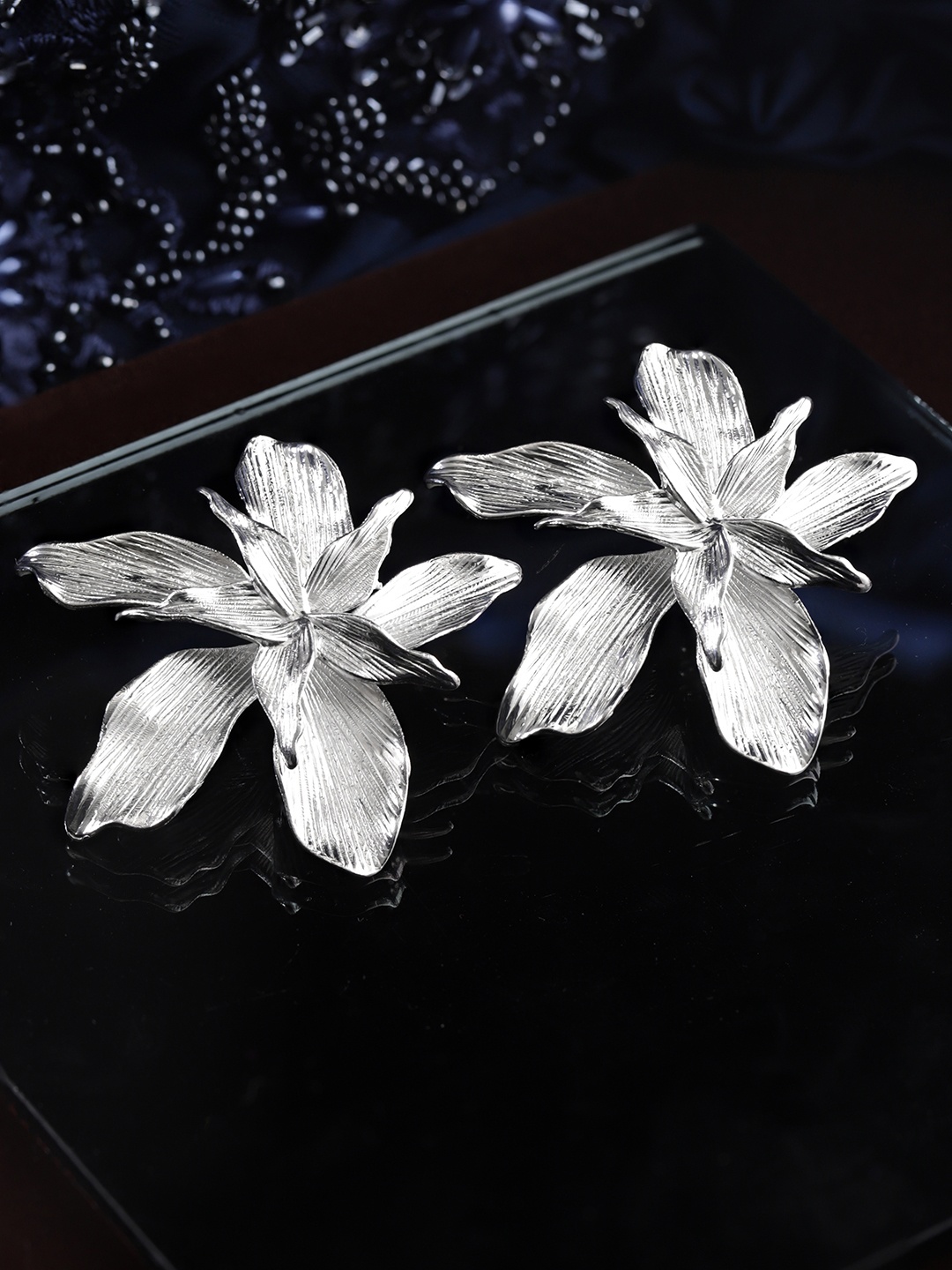 

Rubans Voguish Rhodium Plated Floral Studs Earrings, Silver