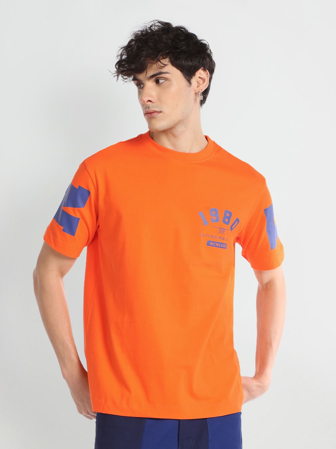 

Flying Machine Typography Printed Round Neck Pure Cotton T-shirt, Orange