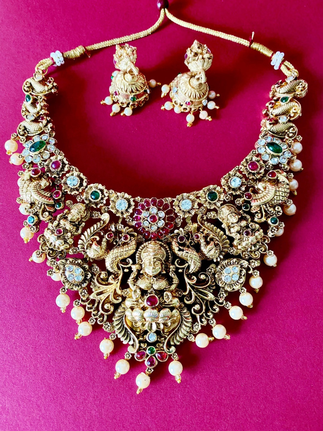 

Pihtara Jewels Gold-Plated Stone-Studded & Beaded Goddess Lakshmi Temple Jewellery Set