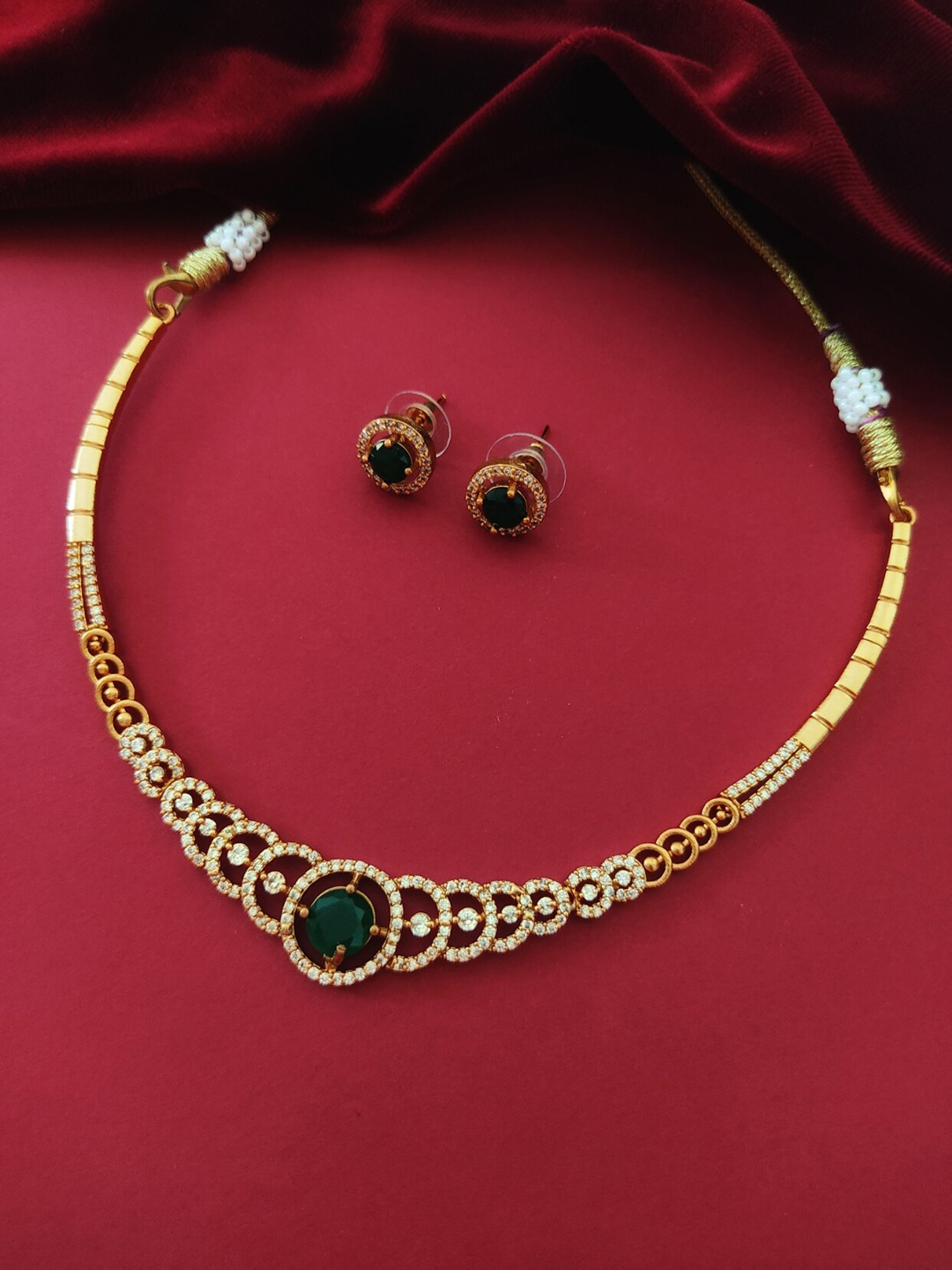 

Pihtara Jewels Gold-Plated American Diamond Studded Jewellery Set