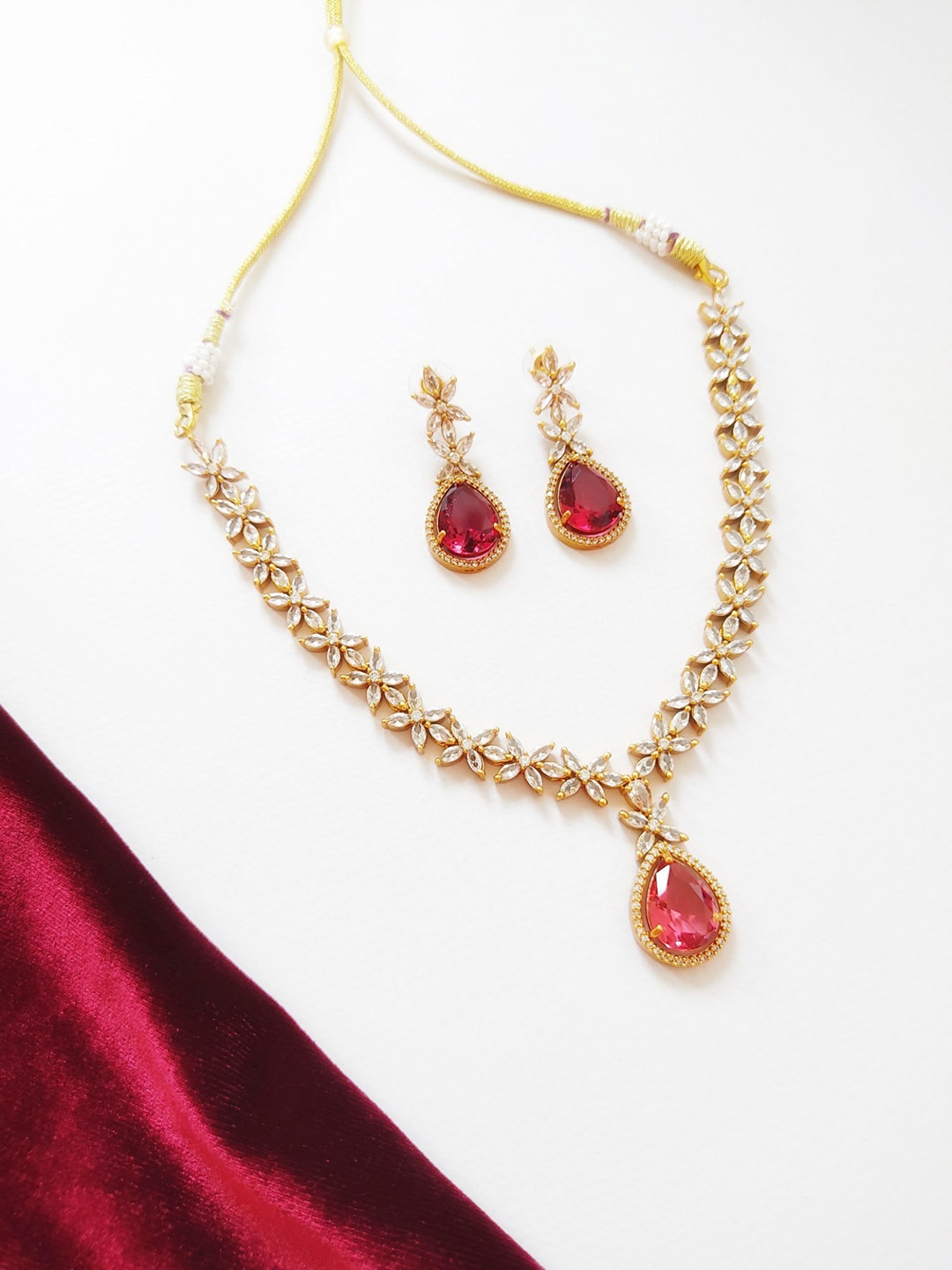 

Pihtara Jewels Gold-Plated American Diamond Studded Jewellery Set