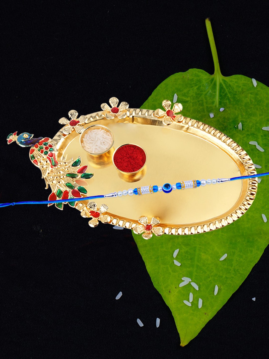 

Silver Shine Evil Eye Beaded Bhaiya Rakhi Roli Chawal &1 Greeting Card With Pooja Thali, Blue