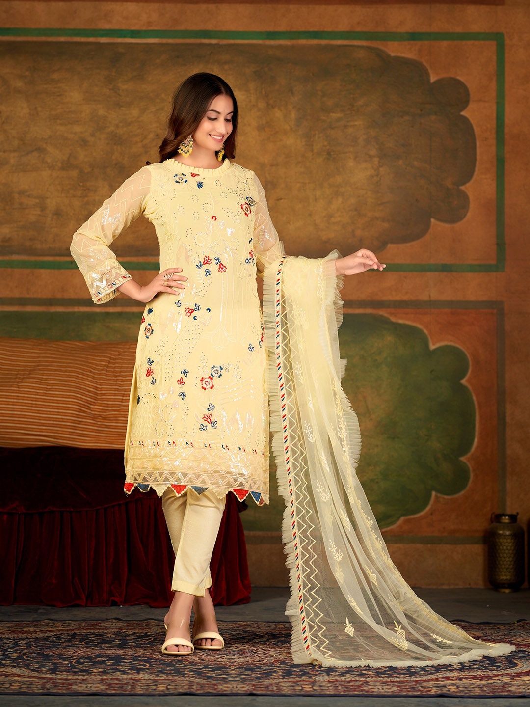 

Atsevam Ethnic Motifs Embroidered Sequinned Semi-Stitched Dress Material, Yellow