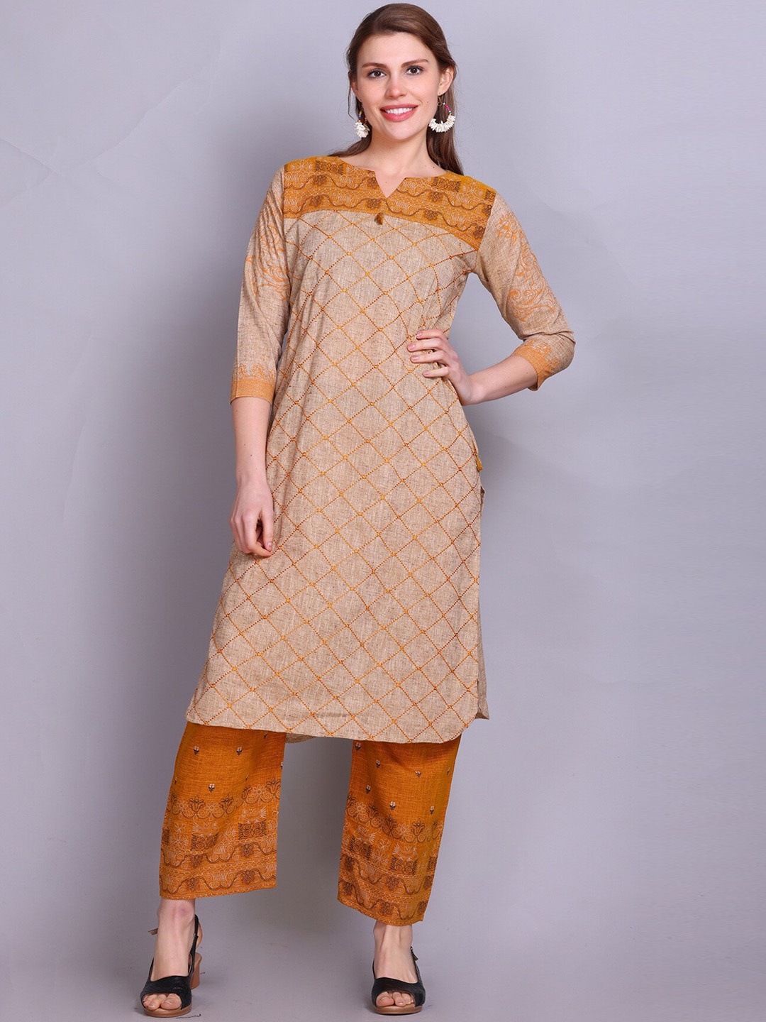 

Elthia Round Neck Geometric Embroidered Thread Work Pure Cotton Kurta with Trouser, Mustard