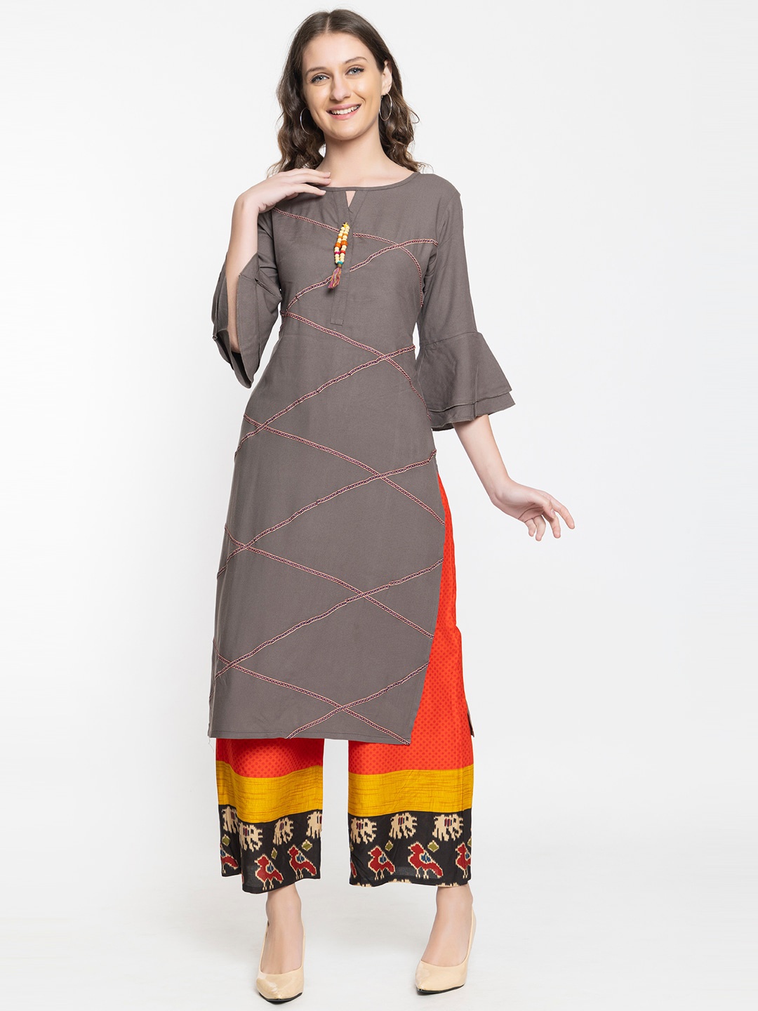 

Elthia Round Neck Geometric Embroidered Beads And Stones Thread Work Kurta with Palazzos, Brown