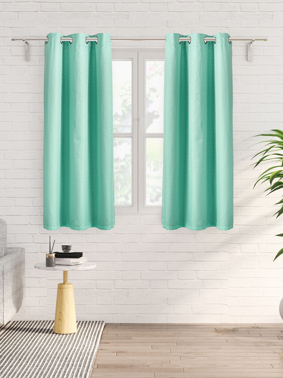 

Home Centre Teal & White 2 Pieces Self Design Black Out Window Curtains