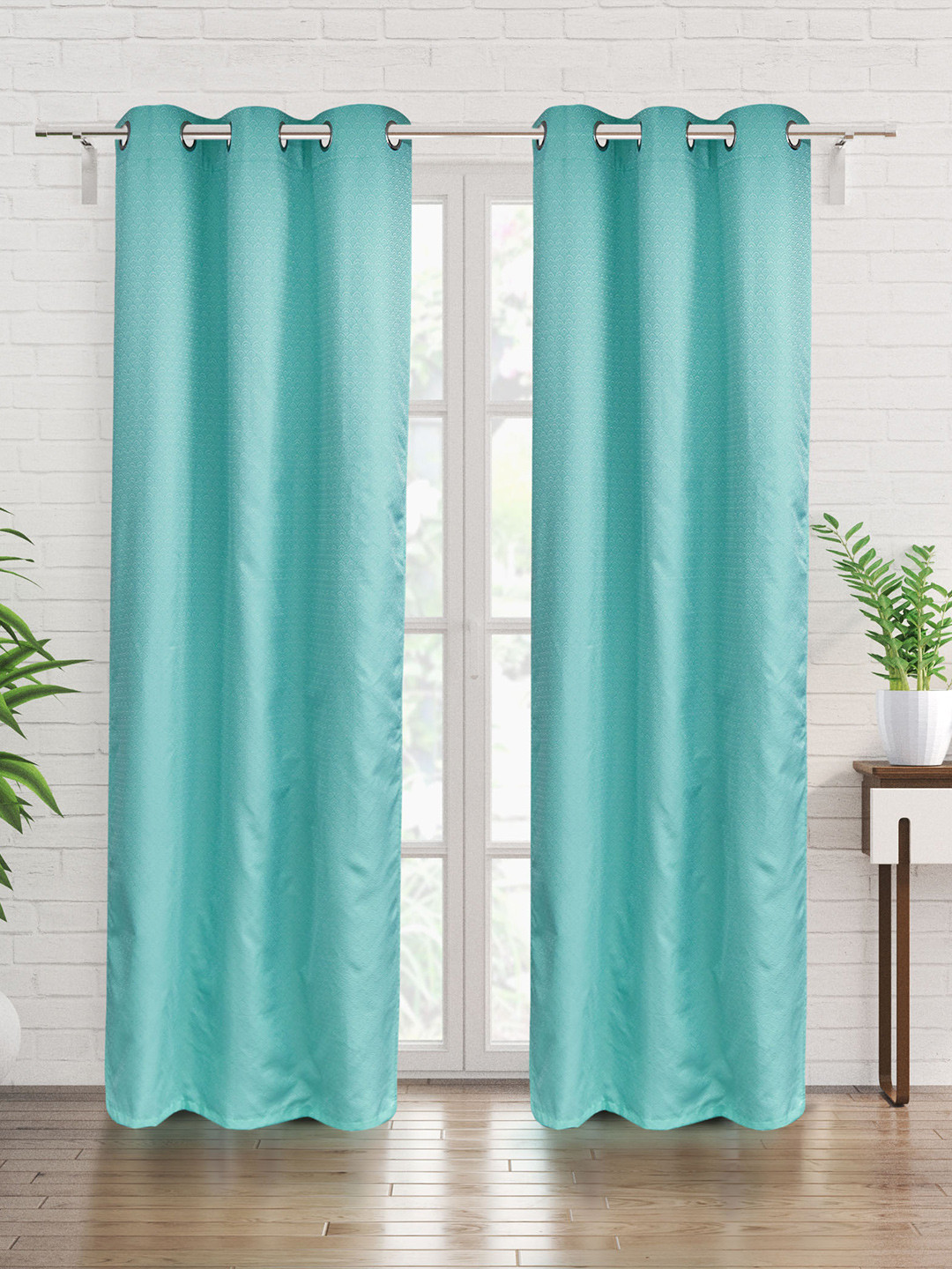 

Home Centre Teal 2 Pieces Self Design Black Out Door Curtains