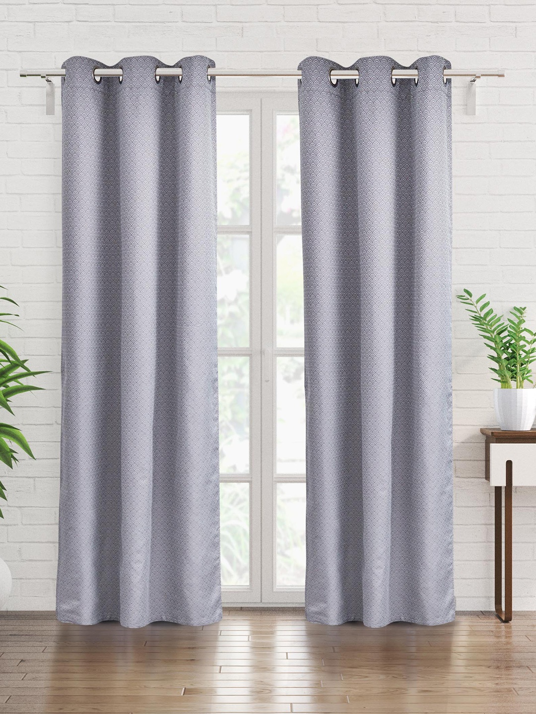

Home Centre Grey & White 2 Pieces Ethnic Motifs Printed Black Out Door Curtains