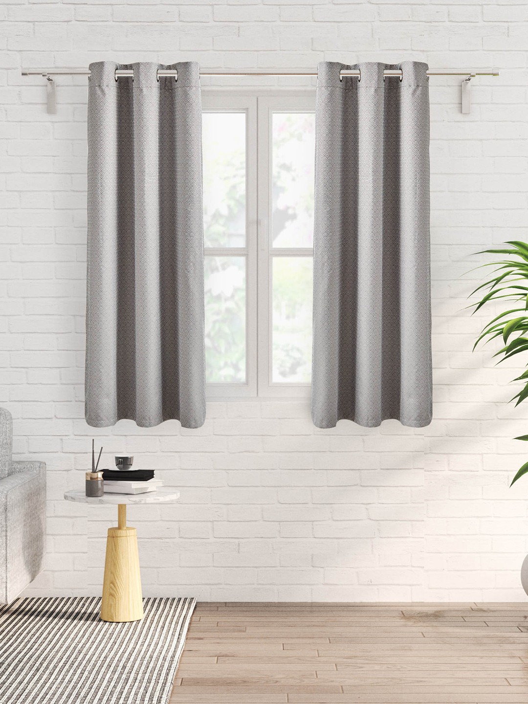 

Home Centre Grey & White 2 Pieces Printed Black Out Window Curtains