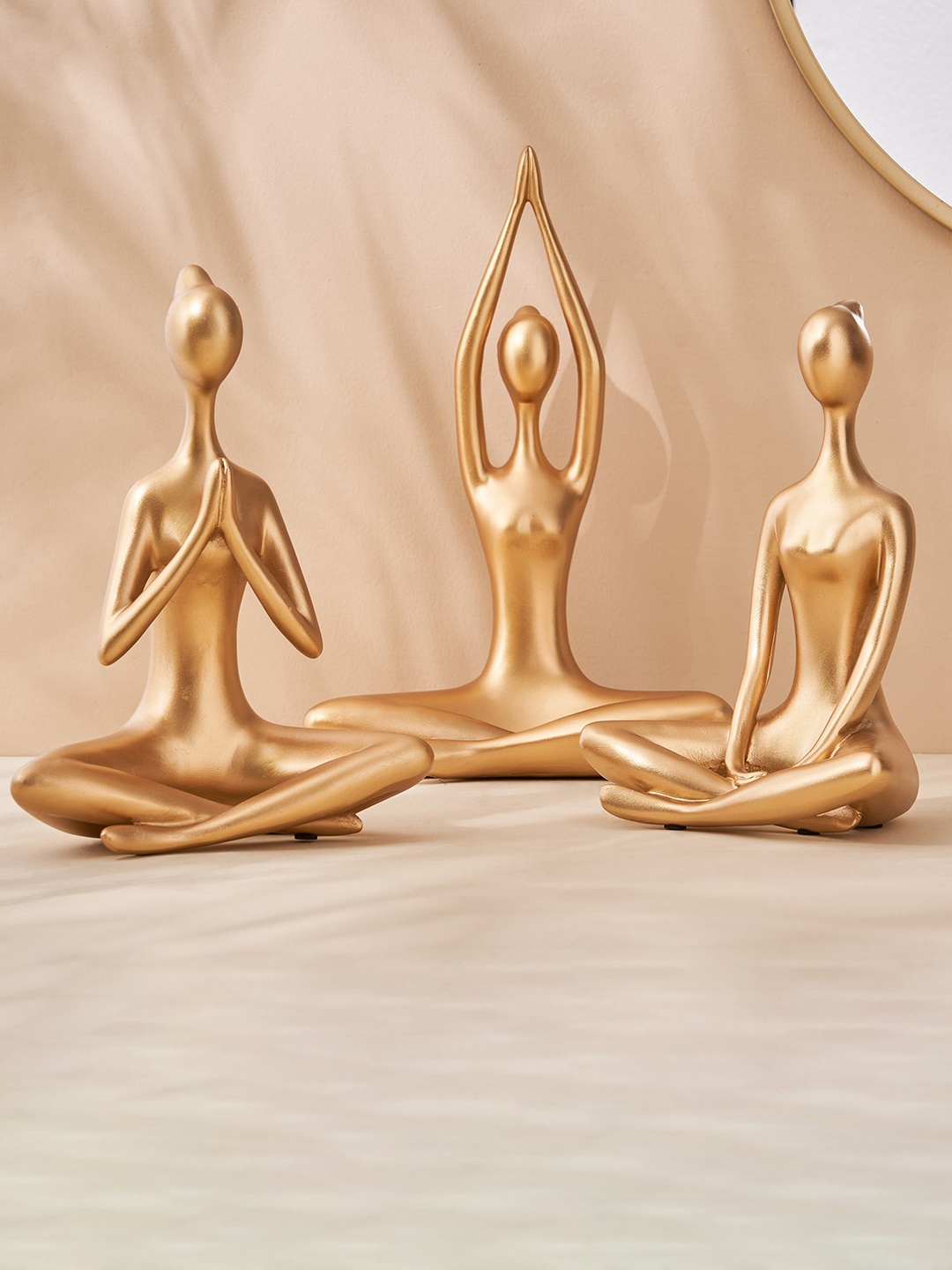 

Home Centre Brighton Gold Toned Yoga Namaskara Figurine Showpiece
