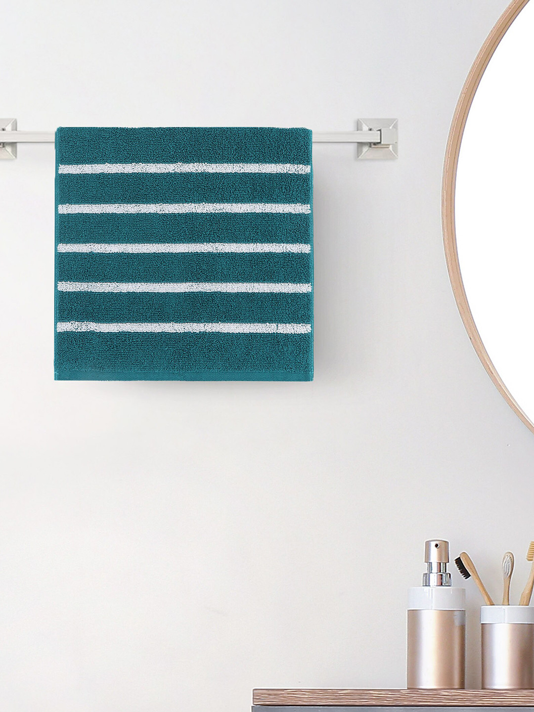

Home Centre Teal Blue & White Striped Colour Refresh Essence 150GSM Cotton Face Towel