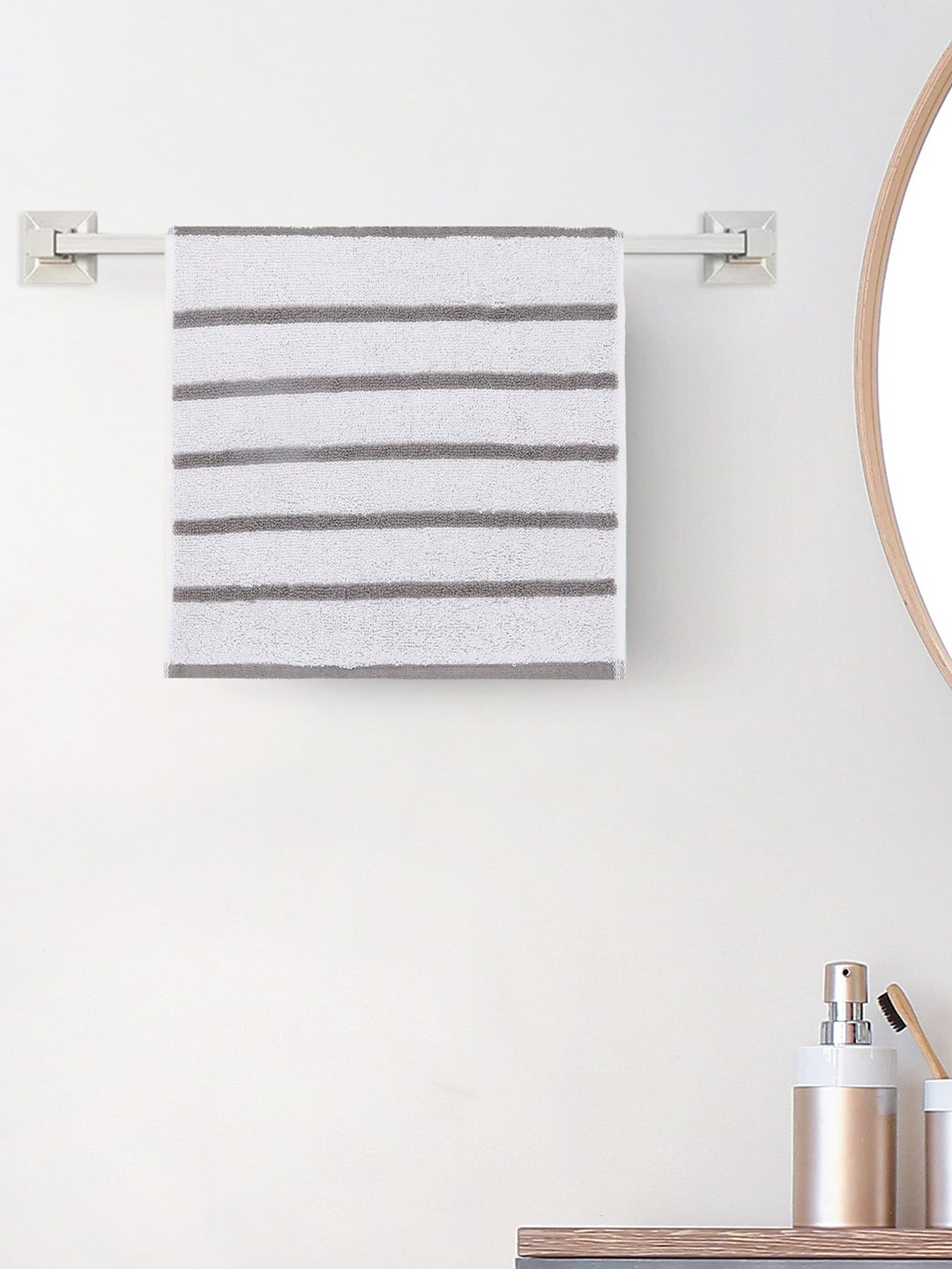 

Home Centre White & Grey Striped 150 GSM Cotton Face Towel