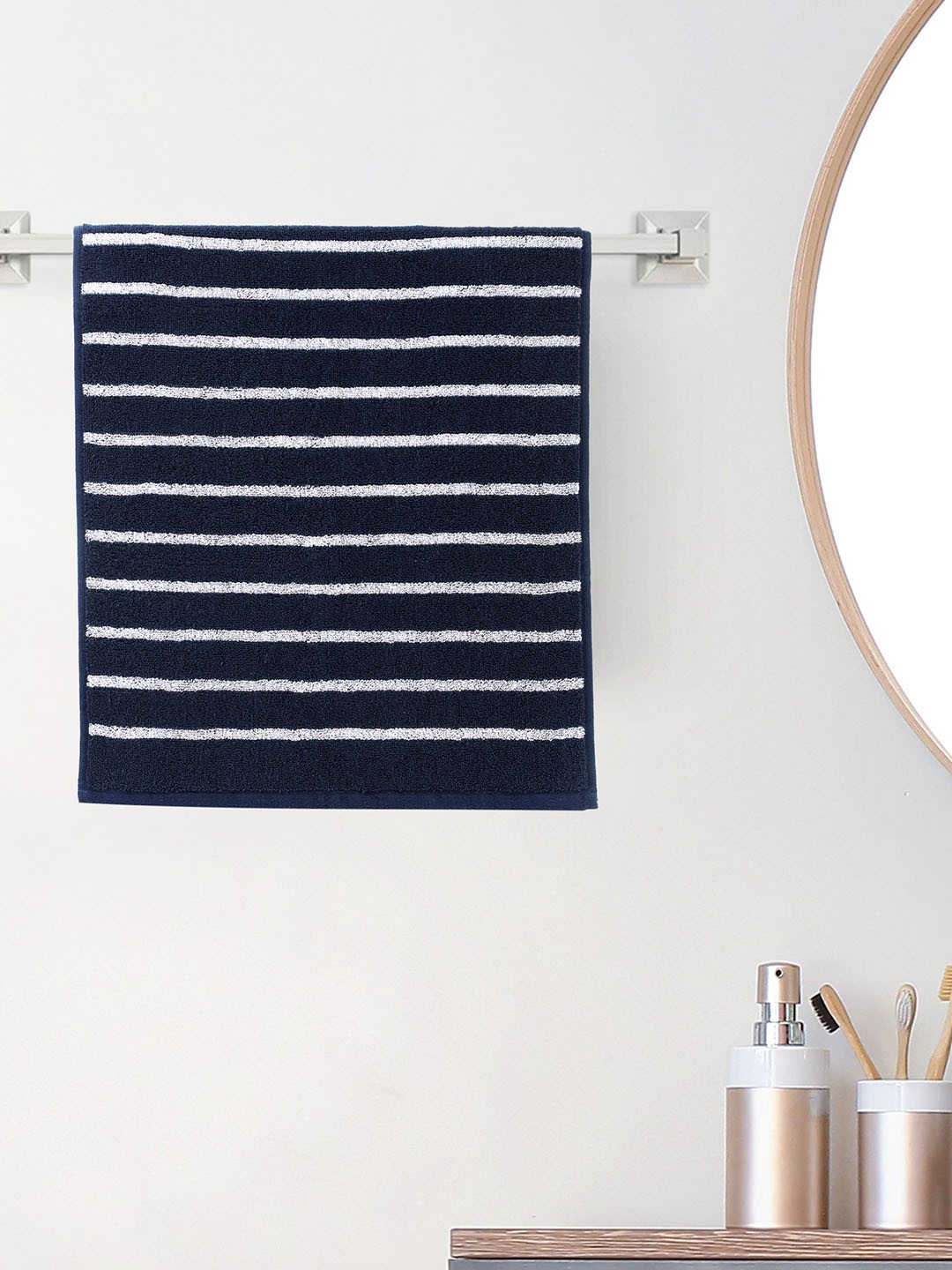 

Home Centre Navy Blue & White Striped Colour Refresh Essence 150 GSM Cotton Hand Towel