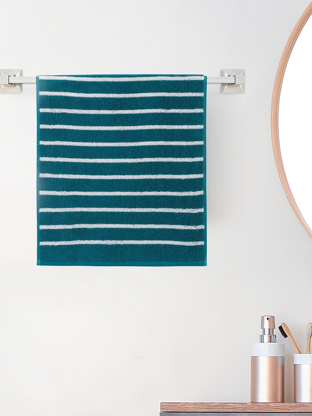 

Home Centre Colour Refresh Essence Teal 150 GSM Cotton Striped Hand Towel
