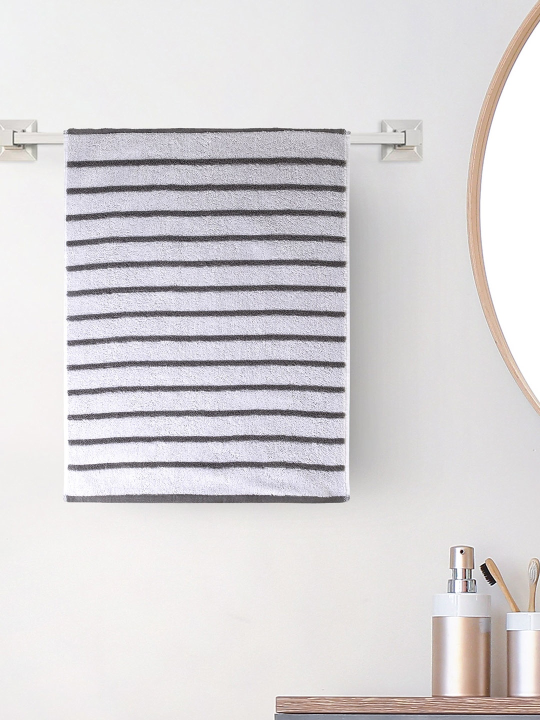 

Home Centre White & Grey Striped 150 GSM Cotton Hand Towel