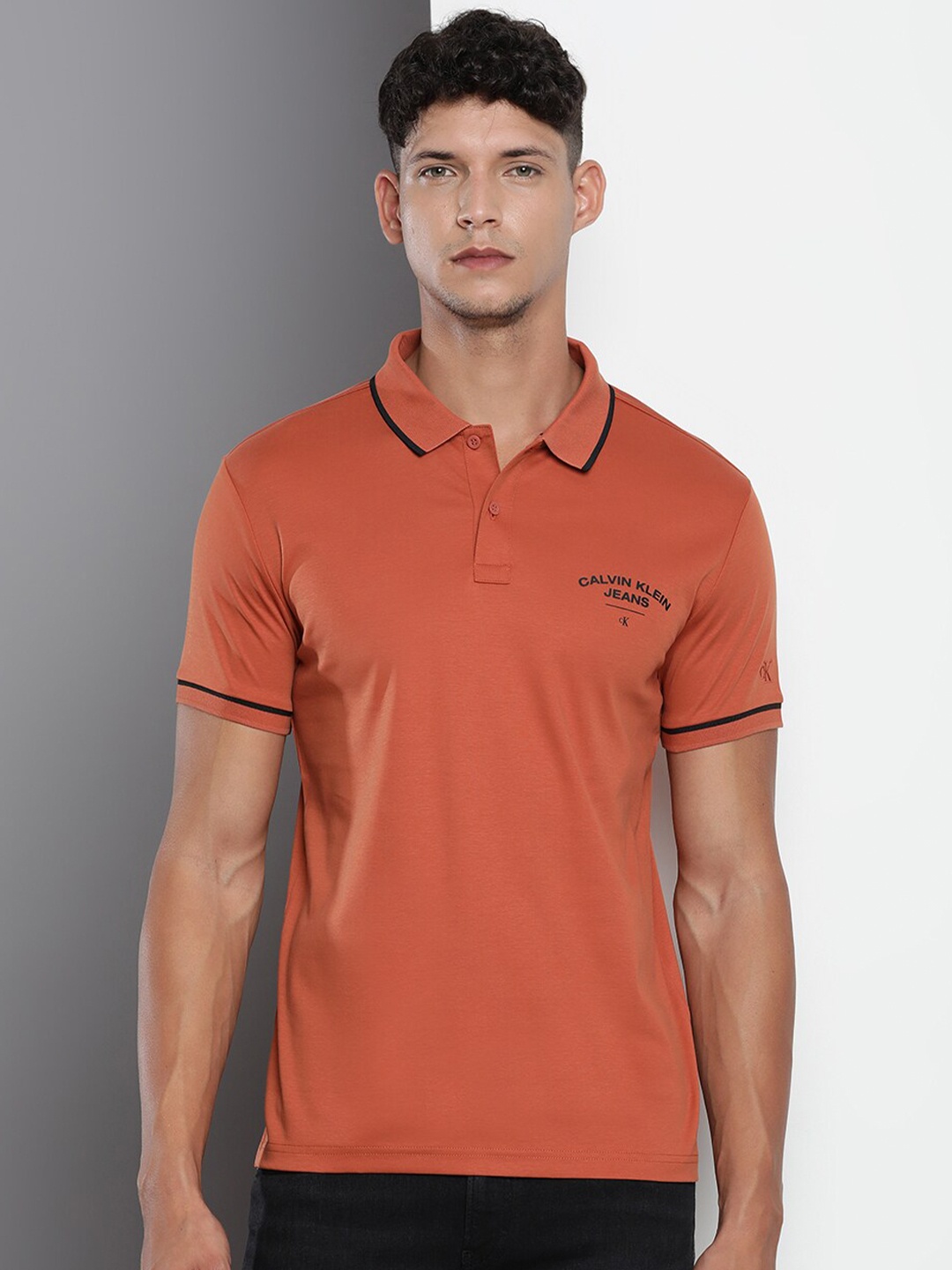 

Calvin Klein Jeans Polo Collar Pure Cotton T-shirt, Rust