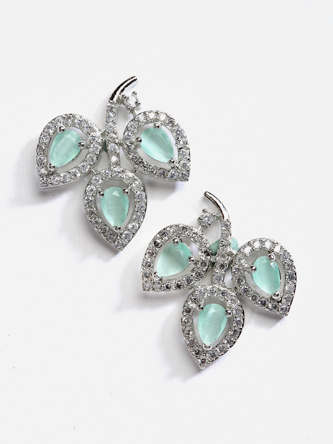 

DressBerry Silver-Toned & Sea Green Rhodium-Plated AD-Studded Leaf Shaped Studs Earrings