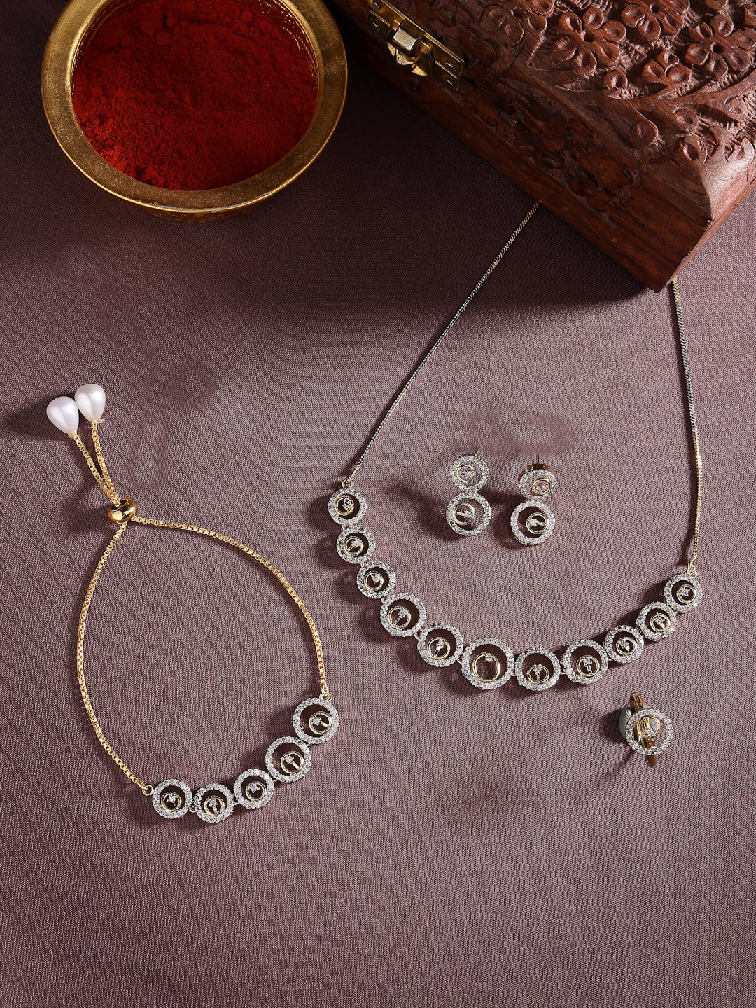 

DressBerry Gold-Plated American Diamond-Studded Circular Jewellery Set