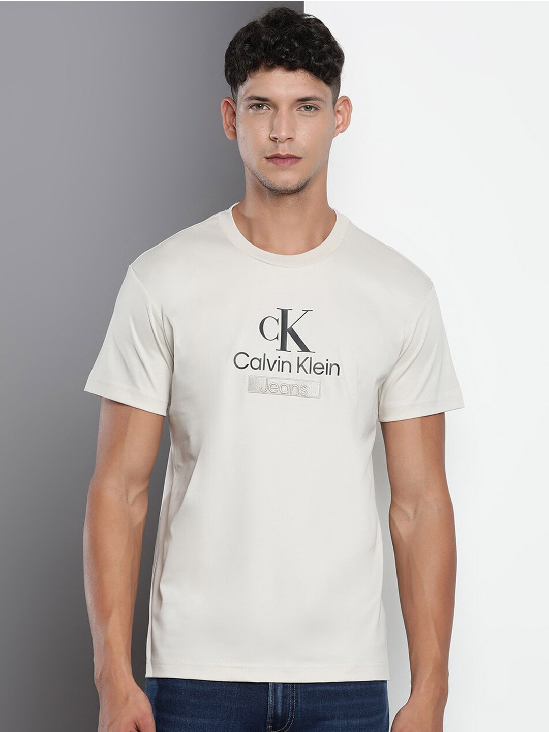 

Calvin Klein Jeans Typography Printed Slim Fit Pure Cotton T-shirt, Beige