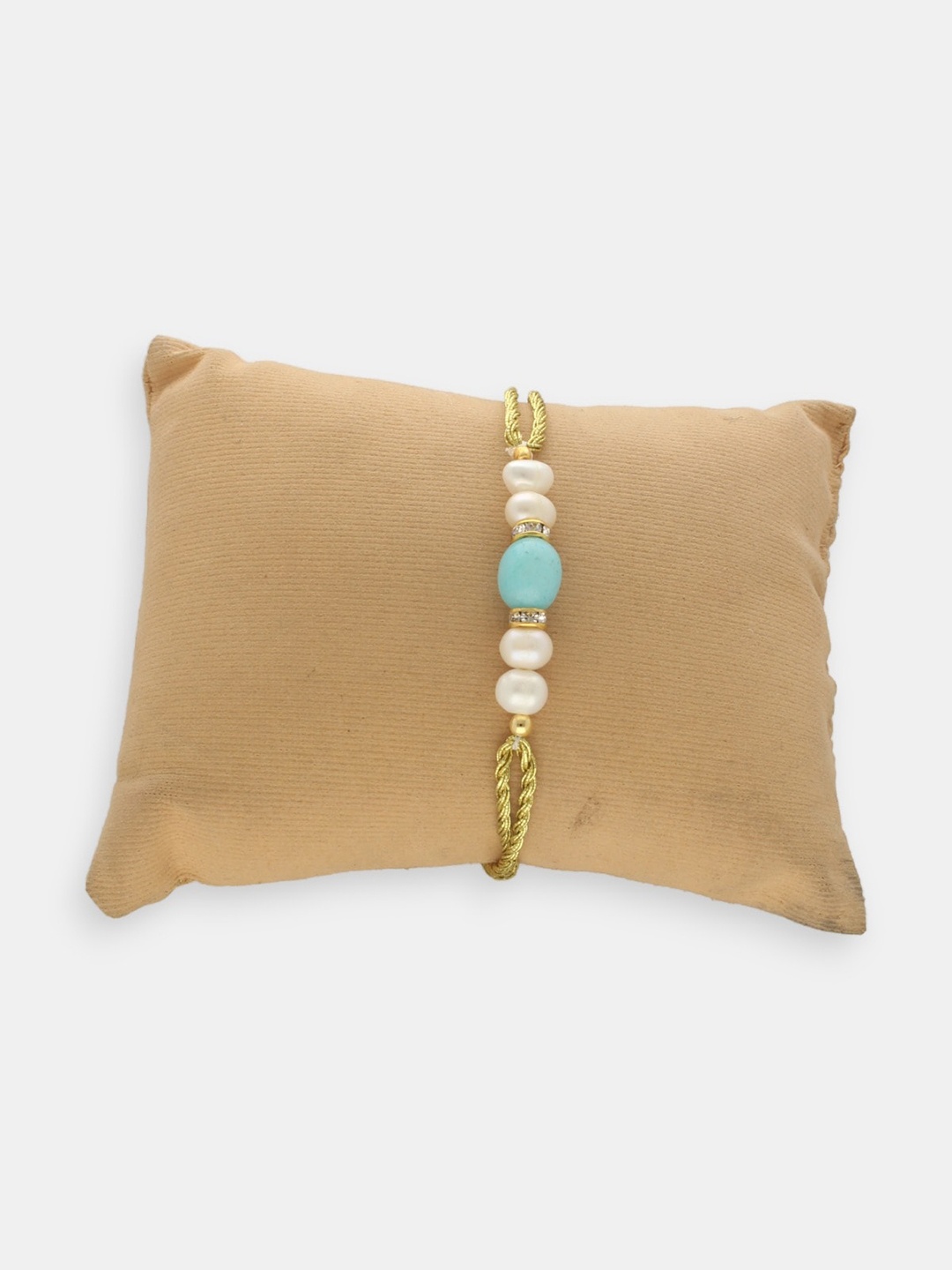 

Sri Jagdamba Pearls Dealer Gold-Plated Beaded Rakhi