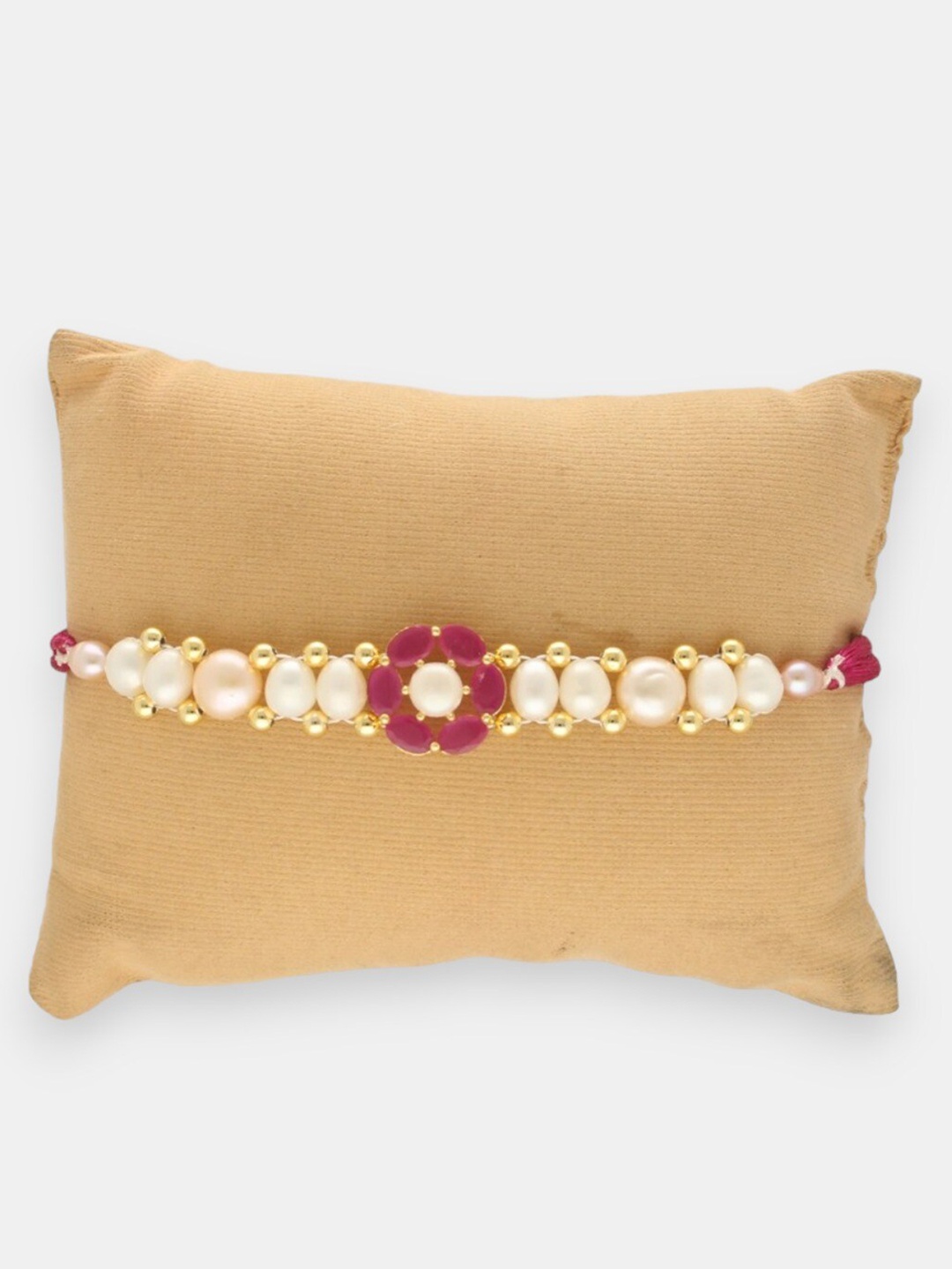 

Sri Jagdamba Pearls Dealer Floral Stone Studded & Beaded Rakhi, White