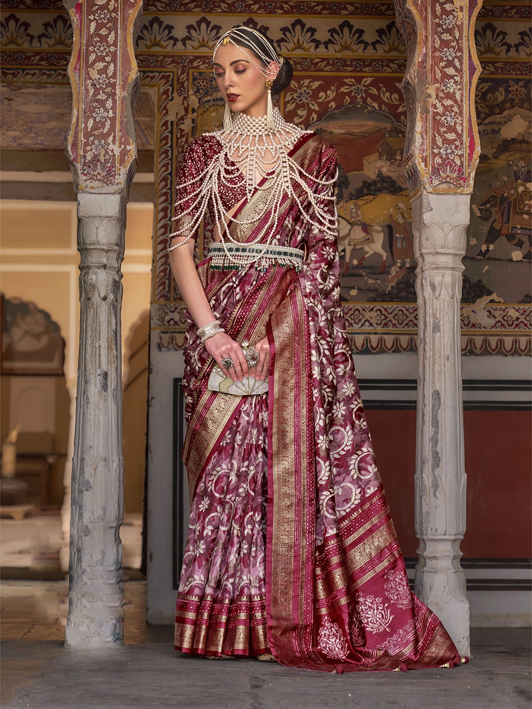 

Mitera Maroon & Gold-Toned Floral Printed Zari Silk Blend Patola Saree