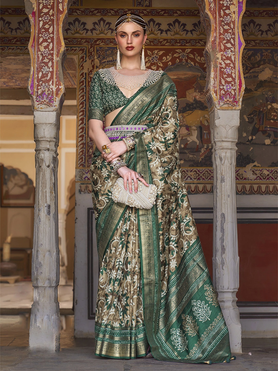 

Mitera Brown & Green Floral Printed Zari Patola Saree
