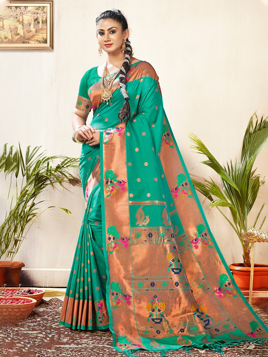 

Mitera Turquoise Blue & Gold-Toned Ethnic Motifs Woven Design Zari Saree