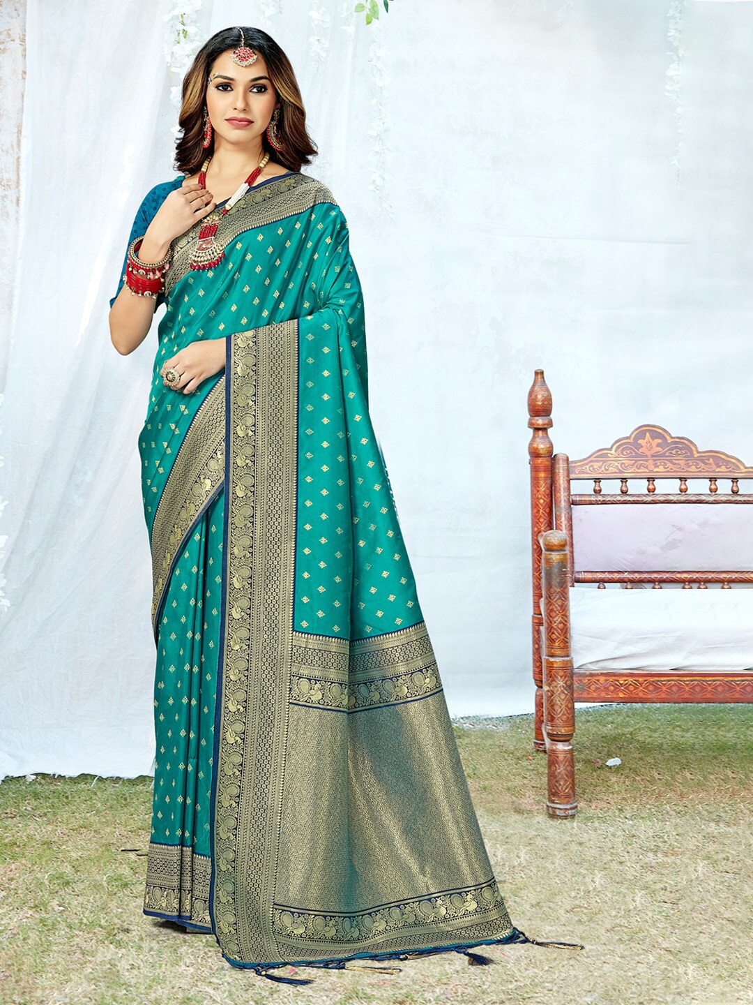 

Mitera Sea Green & Gold-Toned Ethnic Motif Woven Design Zari Saree