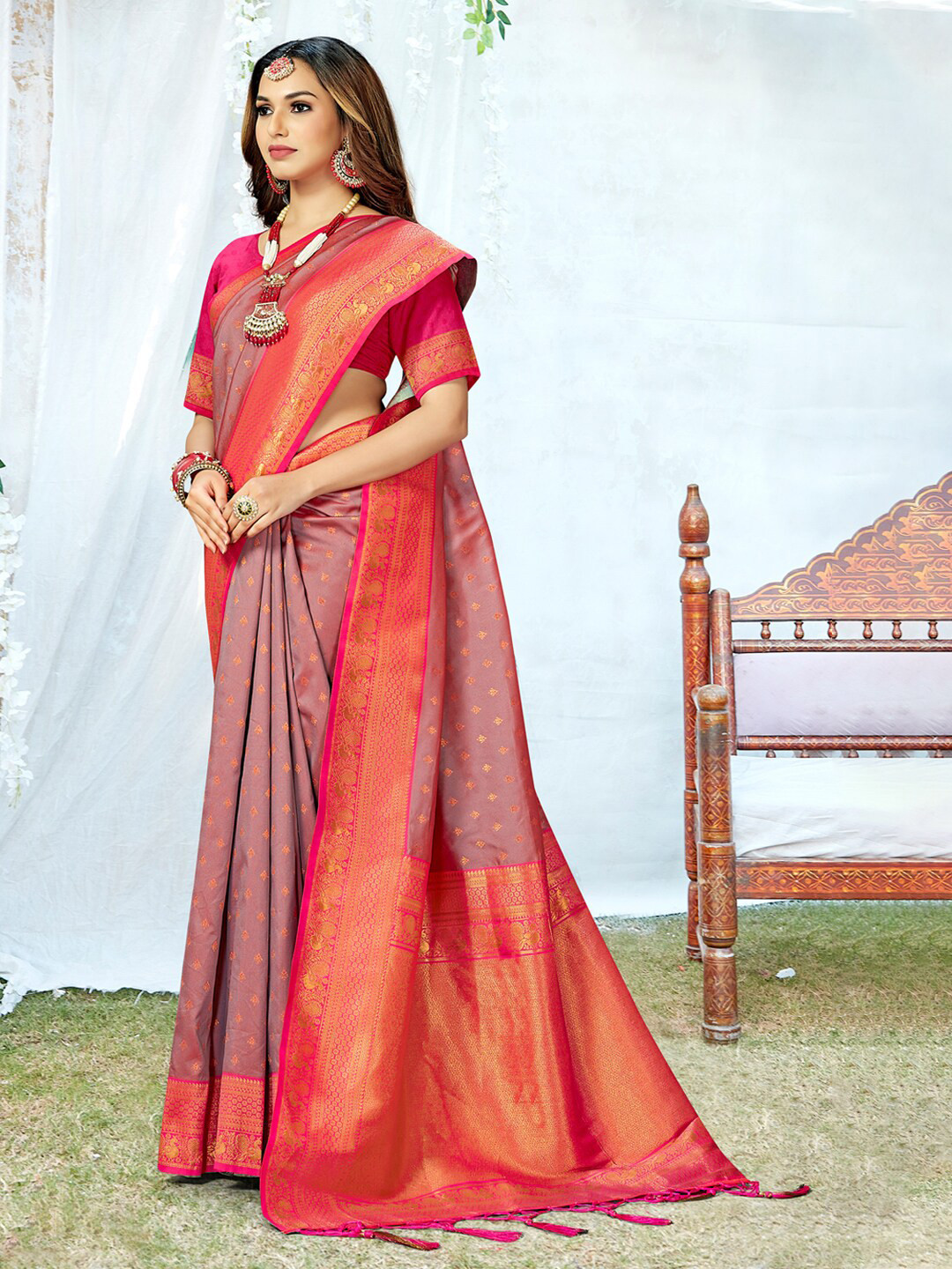 

Mitera Grey & Orange Ethnic Motifs Woven Design Zari Saree