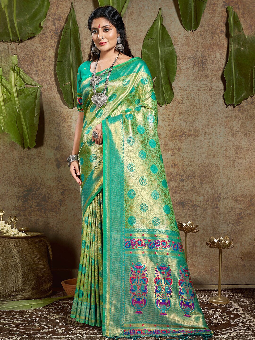 

Mitera Turquoise Blue & Pink Ethnic Motifs Woven Design Zari Pure Silk Saree
