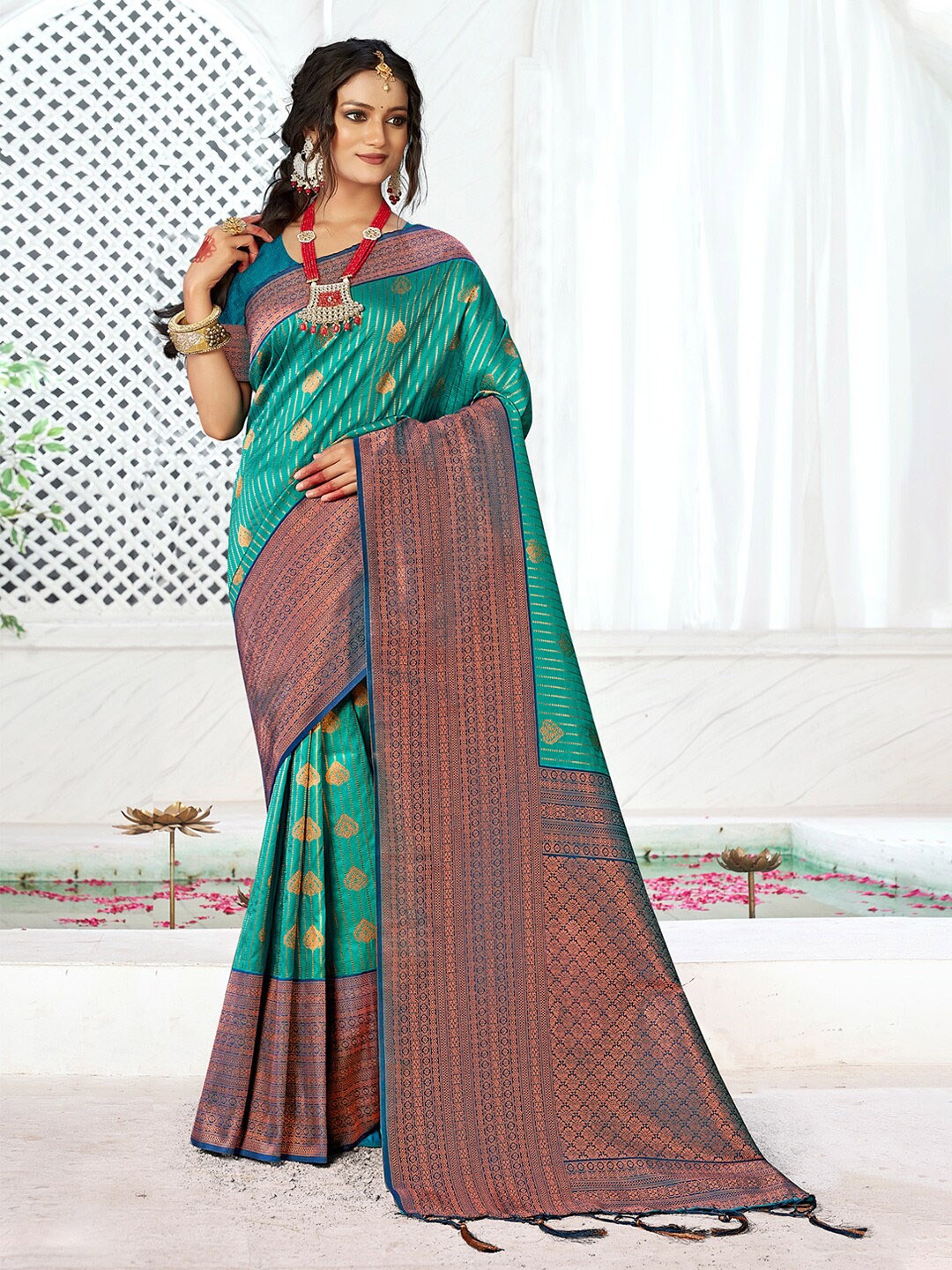 

Mitera Sea Green & Blue Woven Design Zari Saree