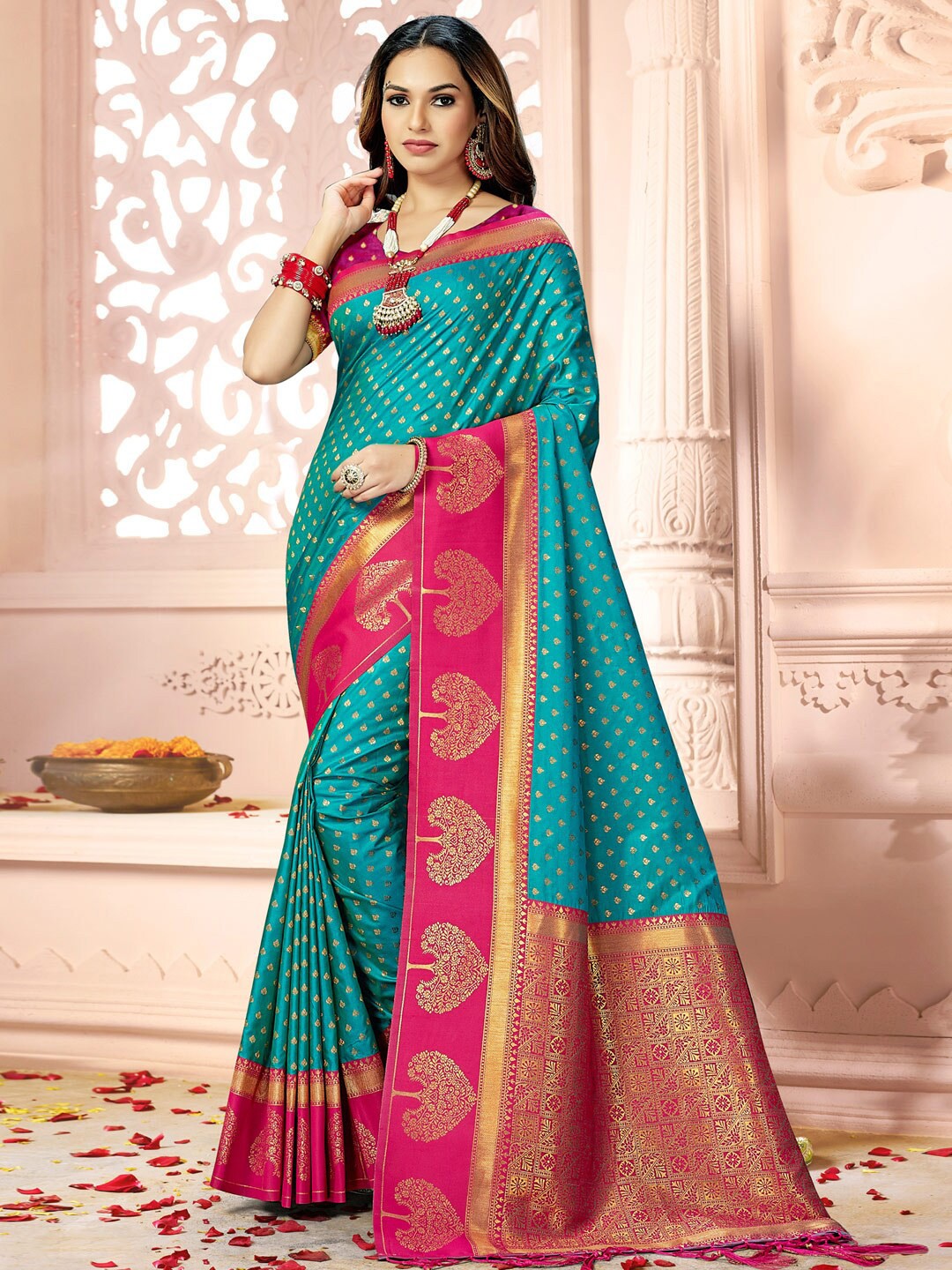 

Mitera Turquoise Blue & Red Ethnic Motifs Woven Design Zari Saree