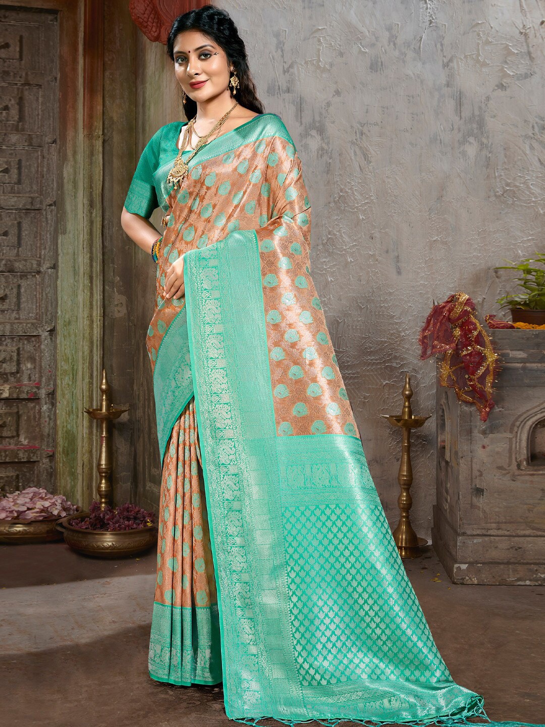 

Mitera Coral & Blue Ethnic Motifs Woven Design Zari Silk Blend Saree
