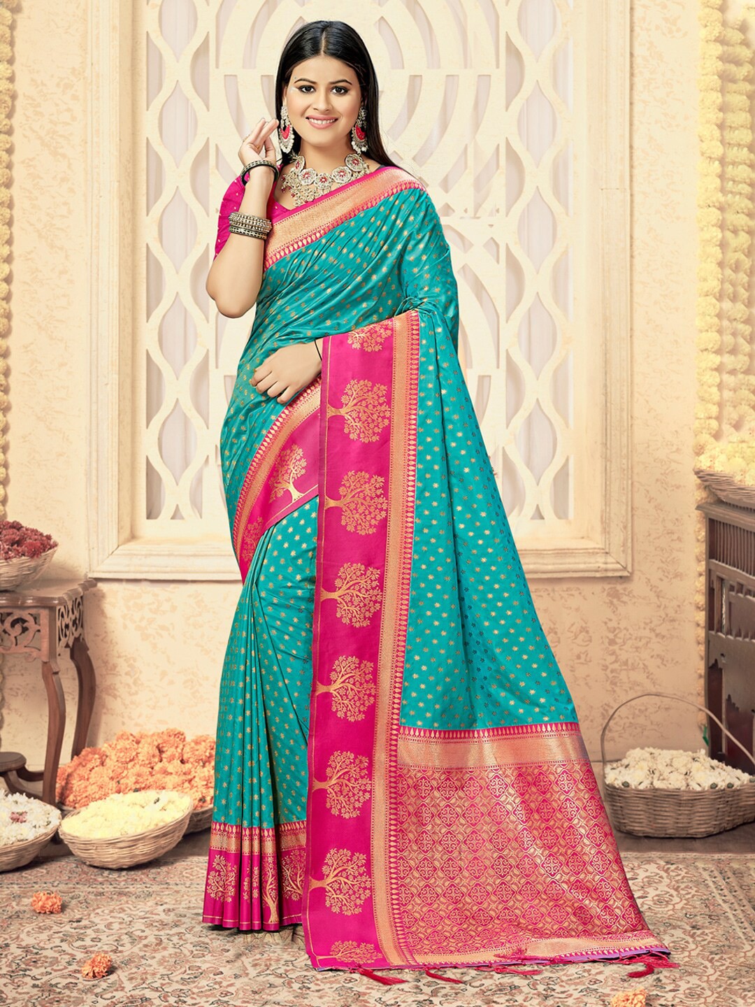 

Mitera Sea Green & Pink Woven Design Zari Silk Blend Saree