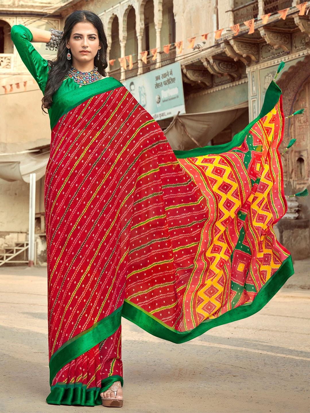 

Mitera Rust & Green Leheriya Pure Chiffon Saree