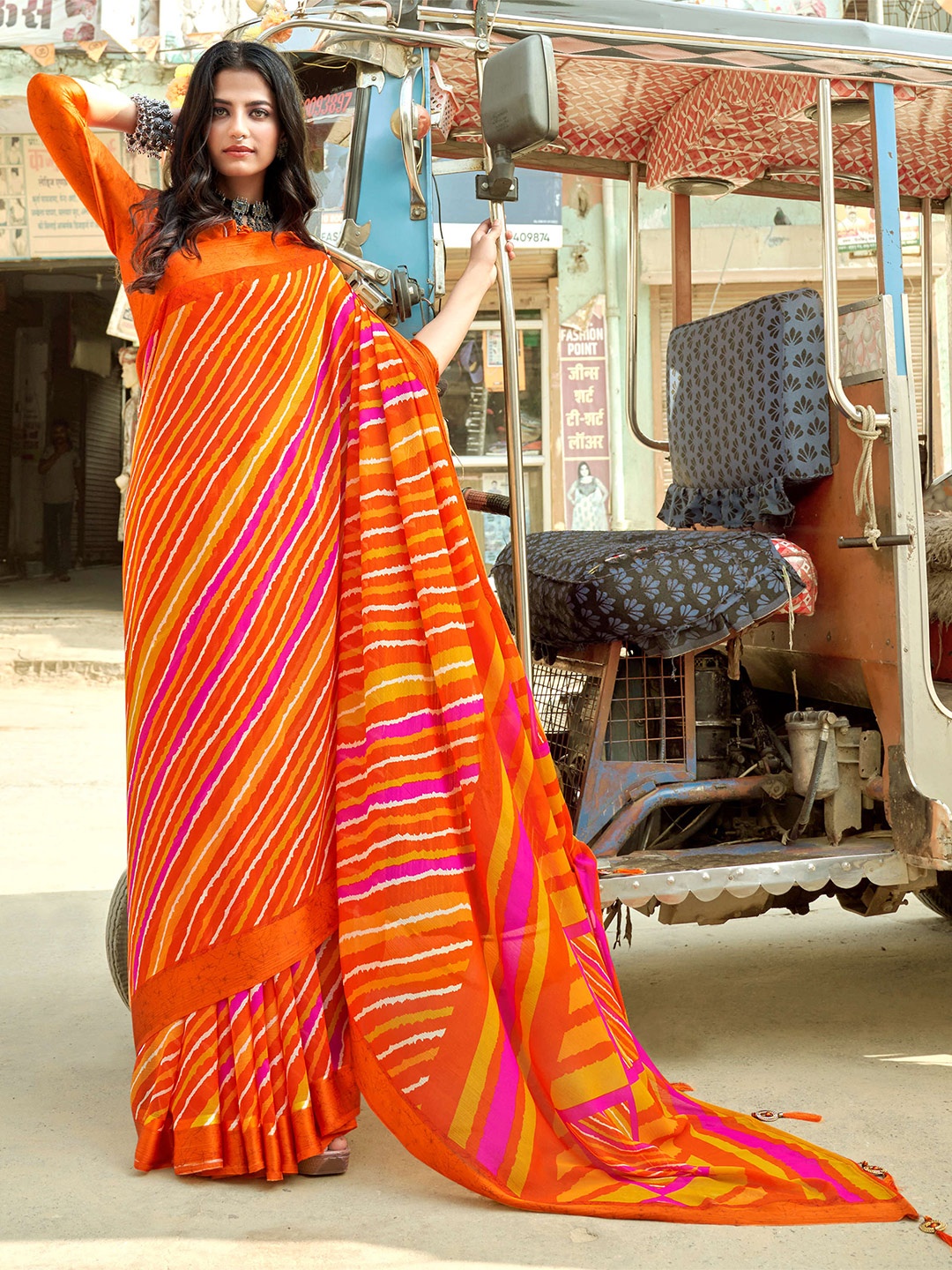 

Mitera Orange & Red Leheriya Printed Pure Chiffon Saree