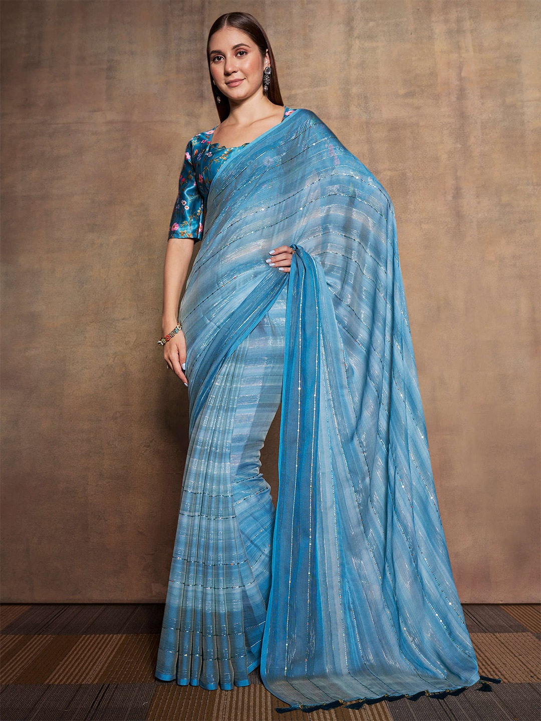 

Mitera Teal Striped Sequinned Pure Chiffon Saree